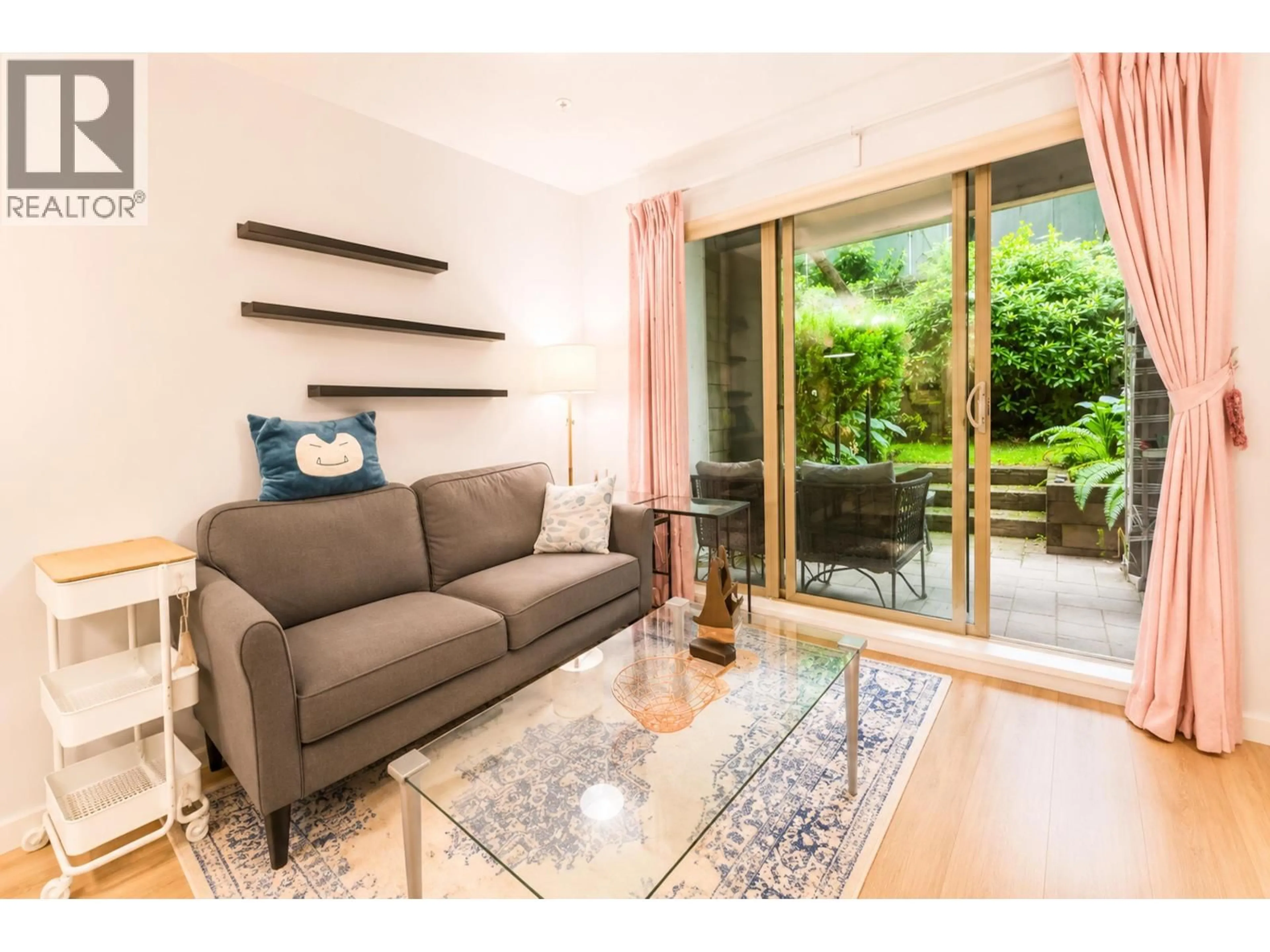 Living room with furniture, wood/laminate floor for 119 - 2088 BETA AVENUE, Burnaby British Columbia V5C0C8