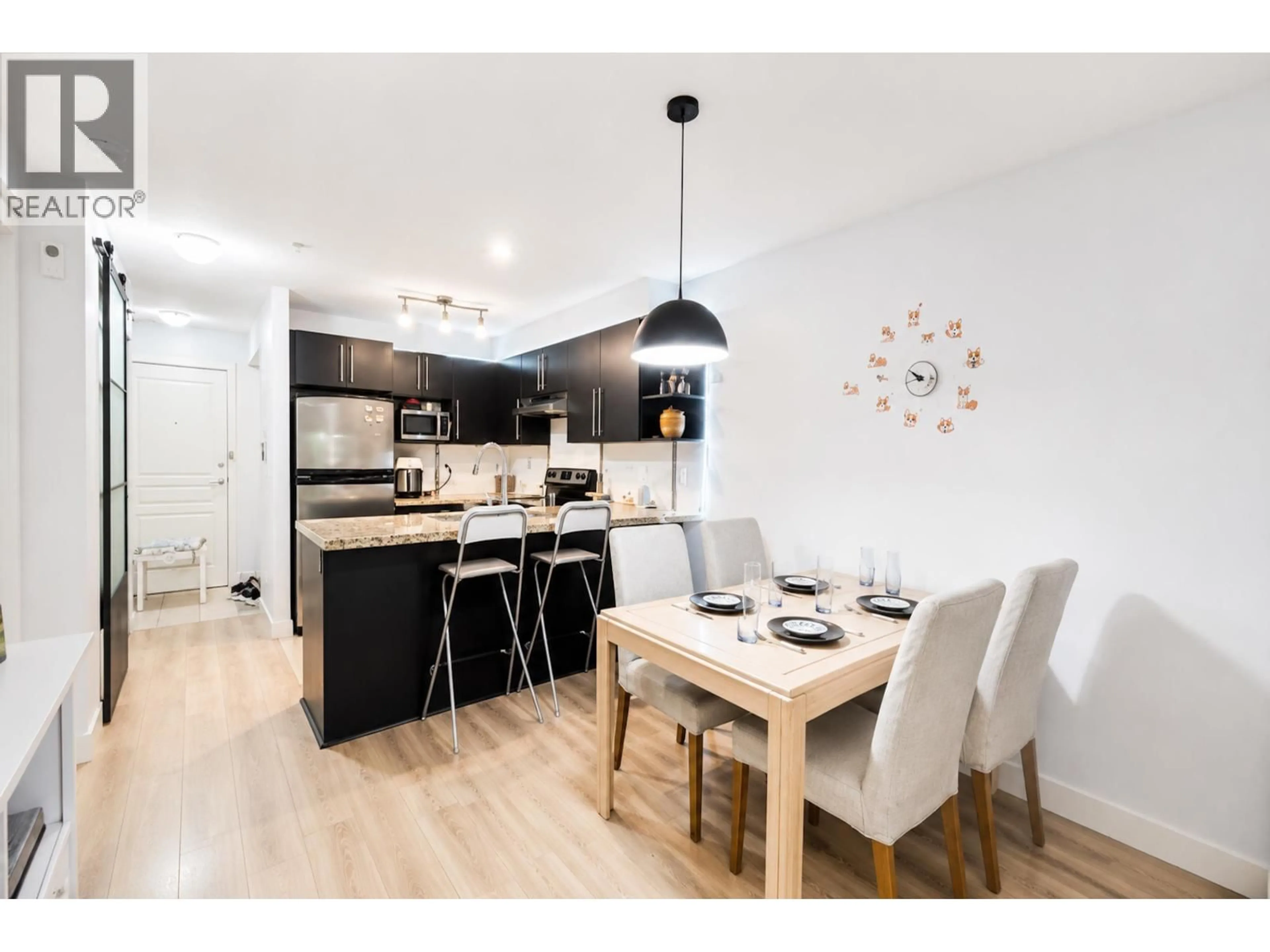 Open concept kitchen, wood/laminate floor for 119 - 2088 BETA AVENUE, Burnaby British Columbia V5C0C8