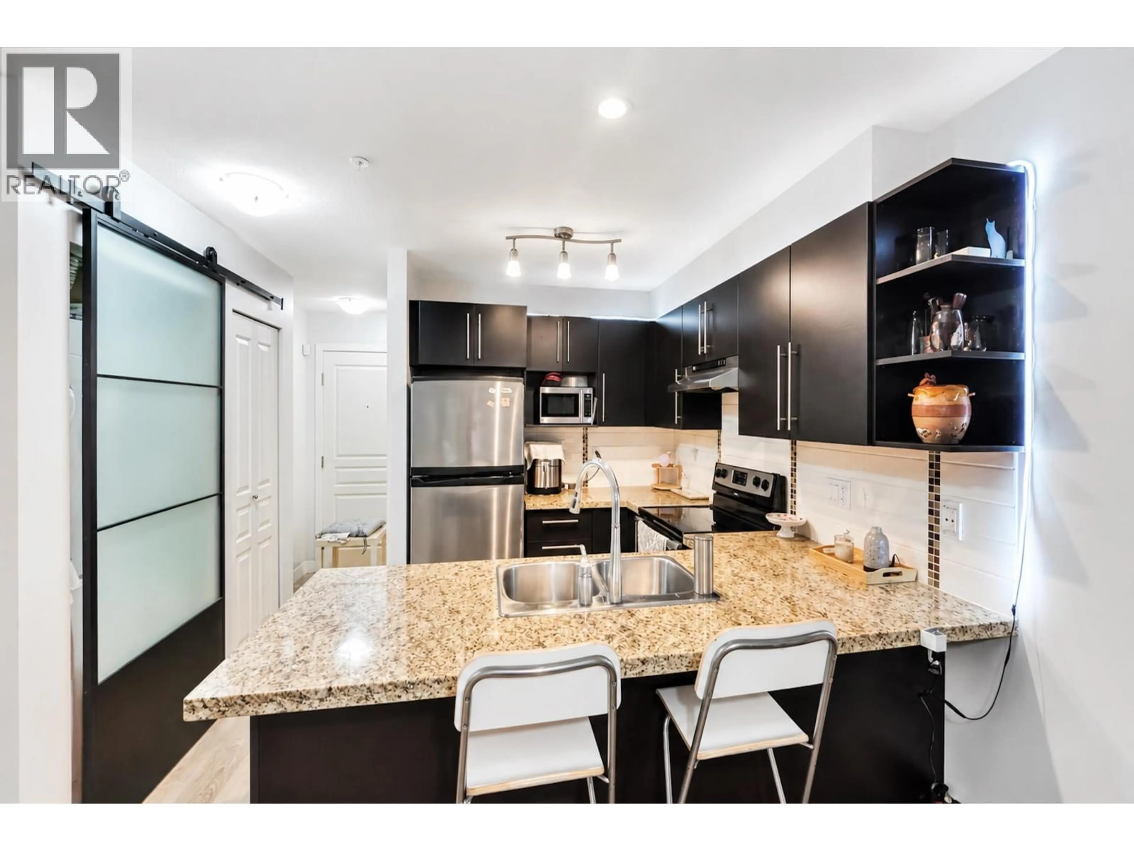 Open concept kitchen, ceramic/tile floor for 119 - 2088 BETA AVENUE, Burnaby British Columbia V5C0C8
