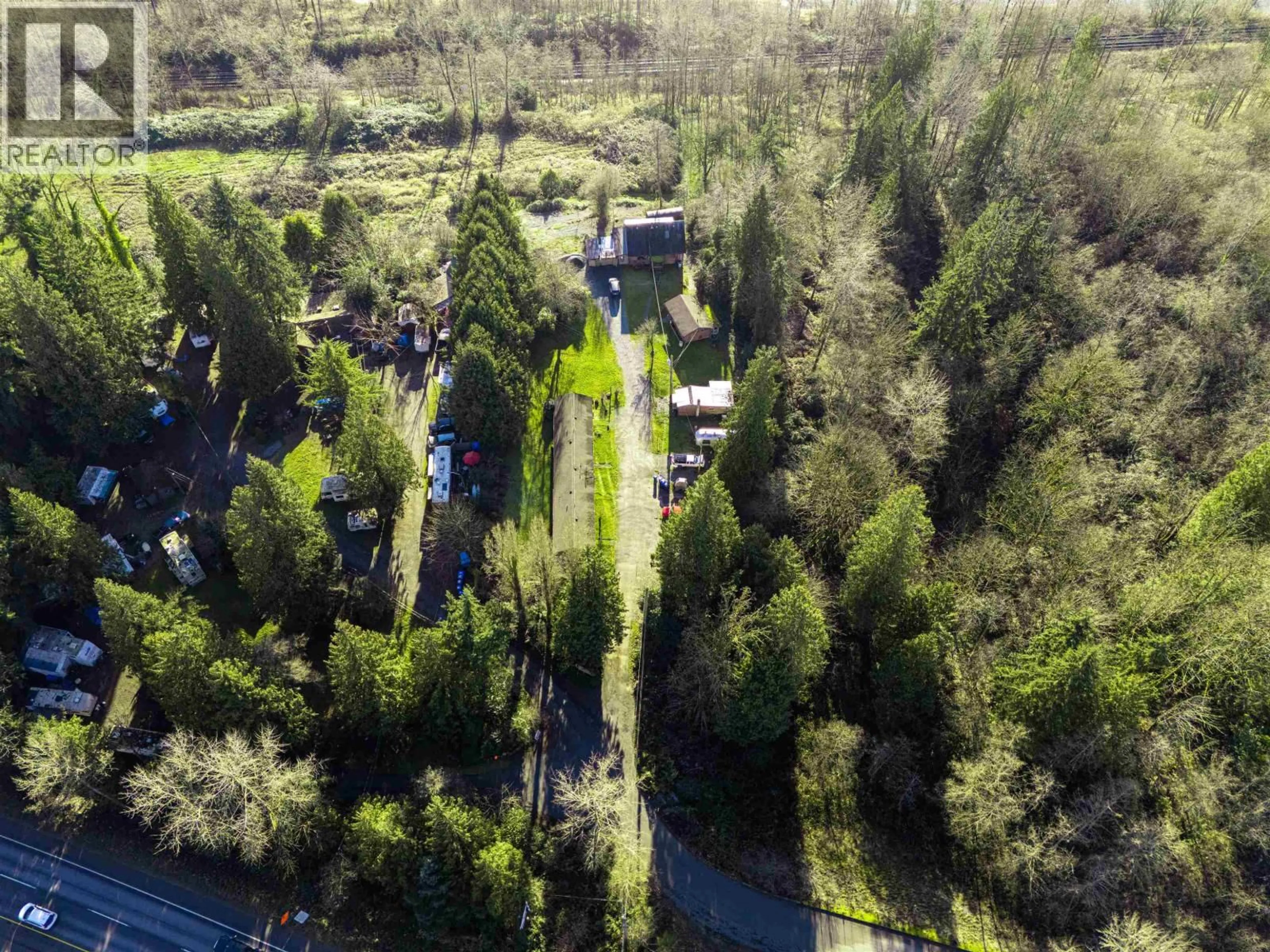 A pic from outside/outdoor area/front of a property/back of a property/a pic from drone, forest/trees view for 24578 LOUGHEED HIGHWAY, Maple Ridge British Columbia V2W1M2
