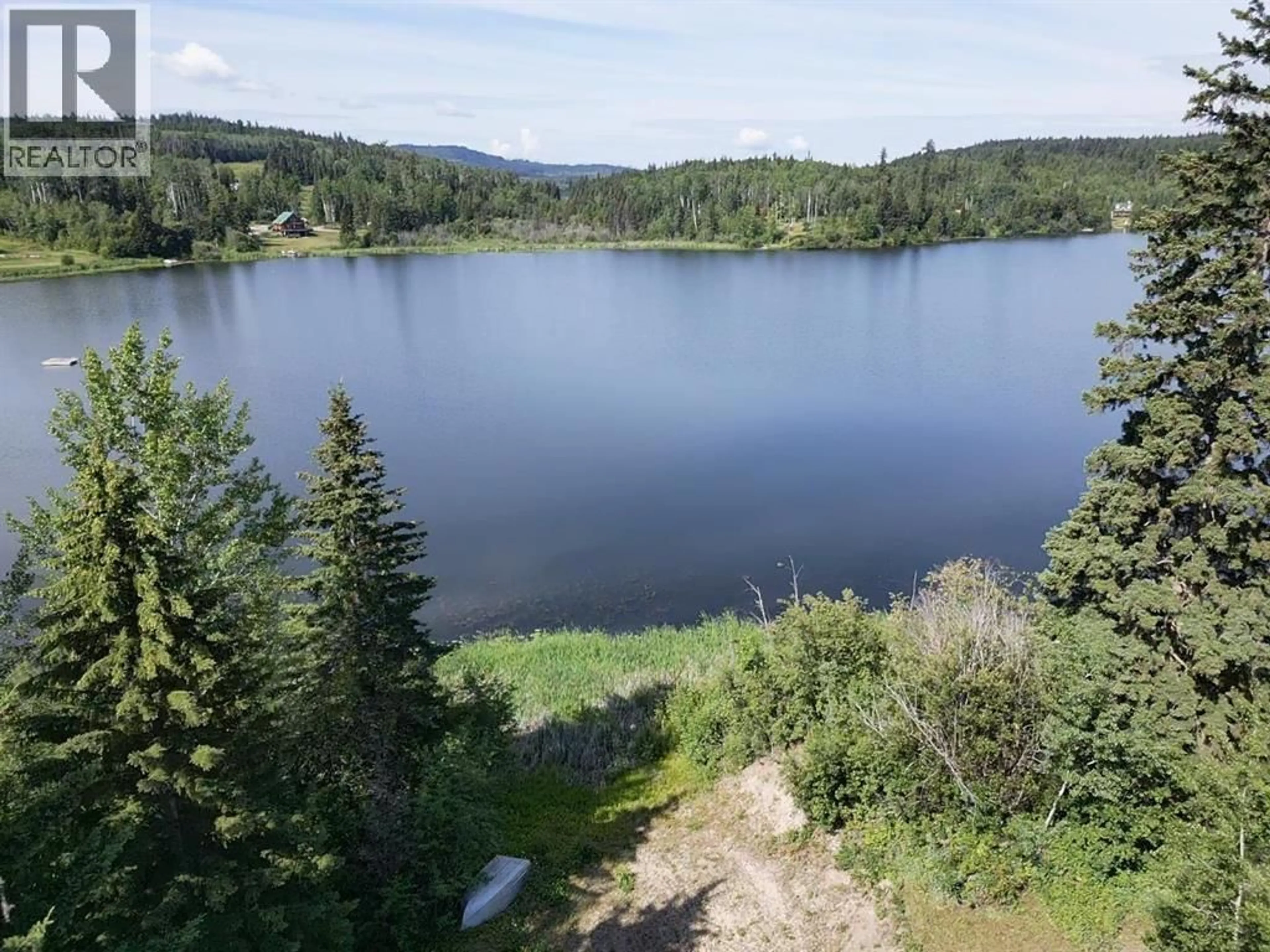A pic from outside/outdoor area/front of a property/back of a property/a pic from drone, water/lake/river/ocean view for 1005 LAKEVIEW ROAD, Fraser Lake British Columbia V0J1S0