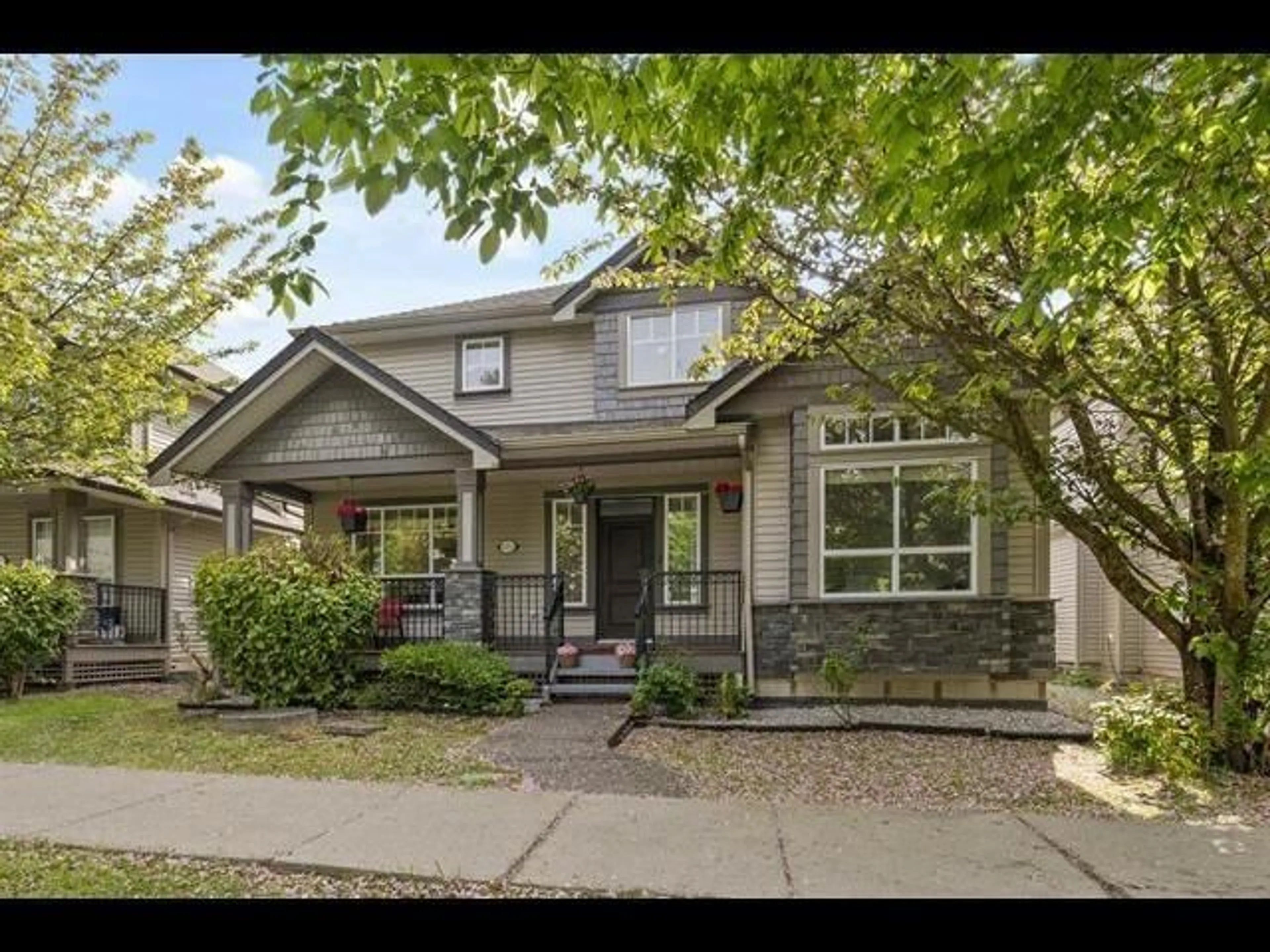 Home with vinyl exterior material, street for 7032 195A STREET, Surrey British Columbia V4N5Z2