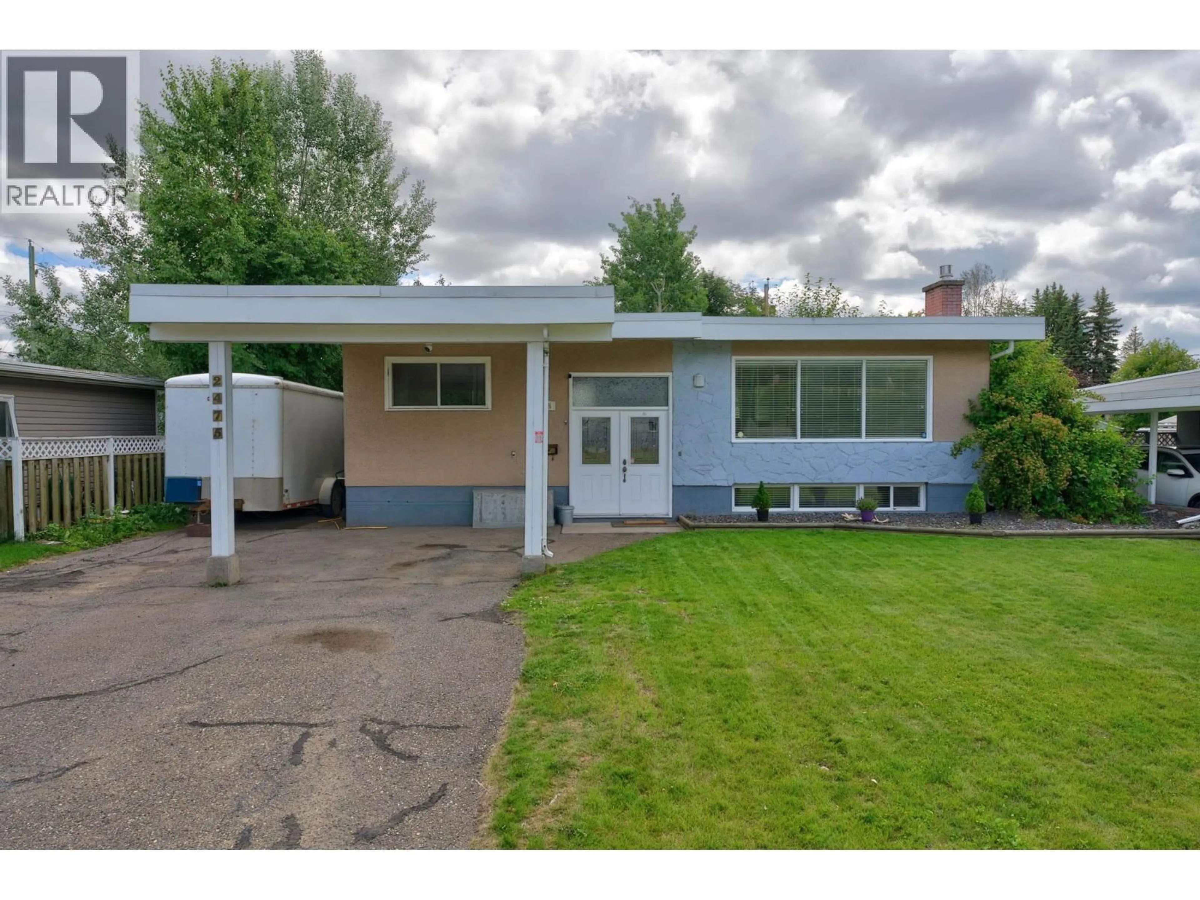 Home with vinyl exterior material, street for 2475 HAMMOND AVENUE, Prince George British Columbia V2M1A6