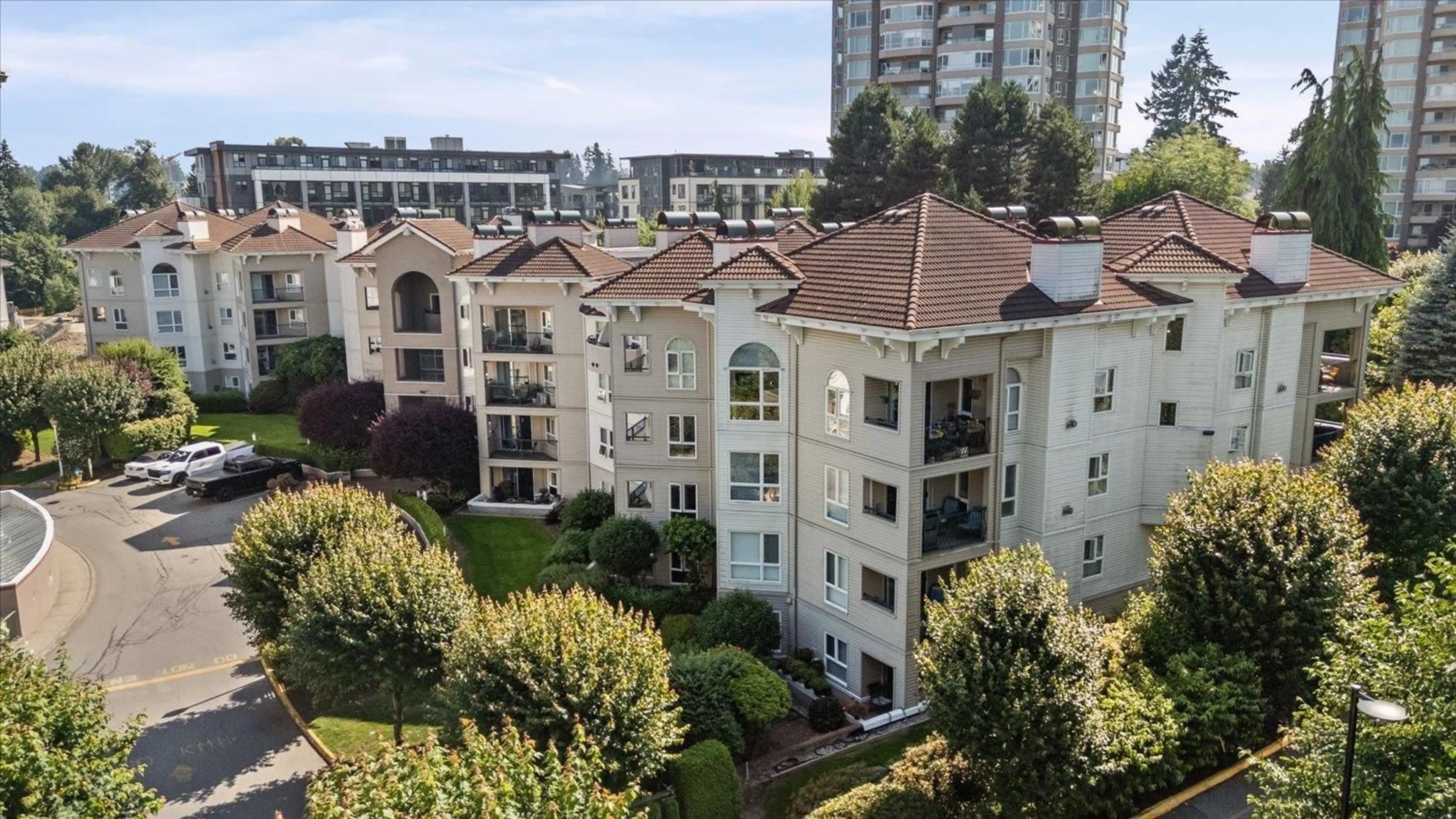 A pic from outside/outdoor area/front of a property/back of a property/a pic from drone, city buildings view from balcony for 107 - 3172 GLADWIN ROAD, Abbotsford British Columbia V2T5T3