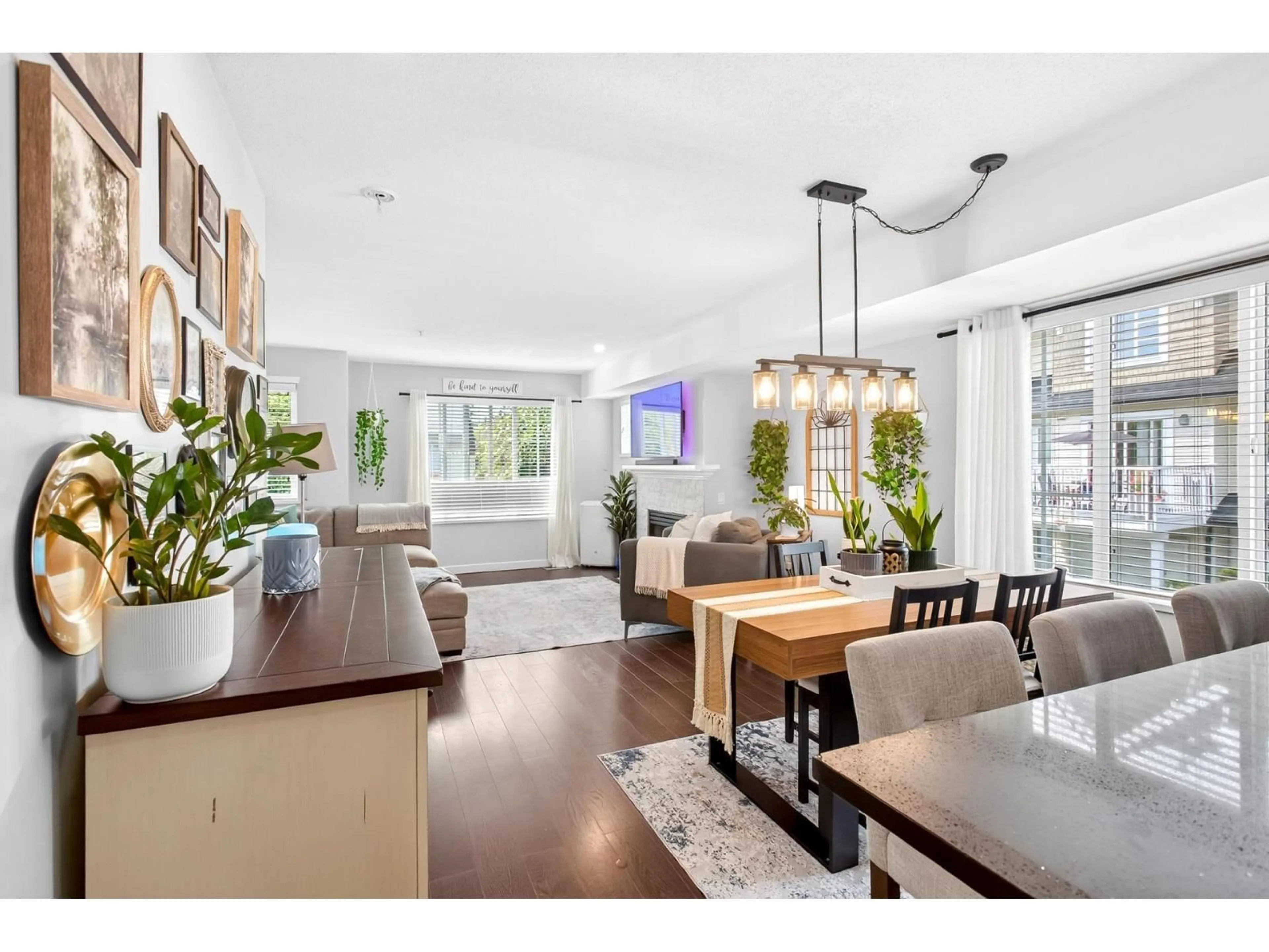 Open concept kitchen, wood/laminate floor for 61 - 20560 66 AVENUE, Langley British Columbia V2Y2Y8