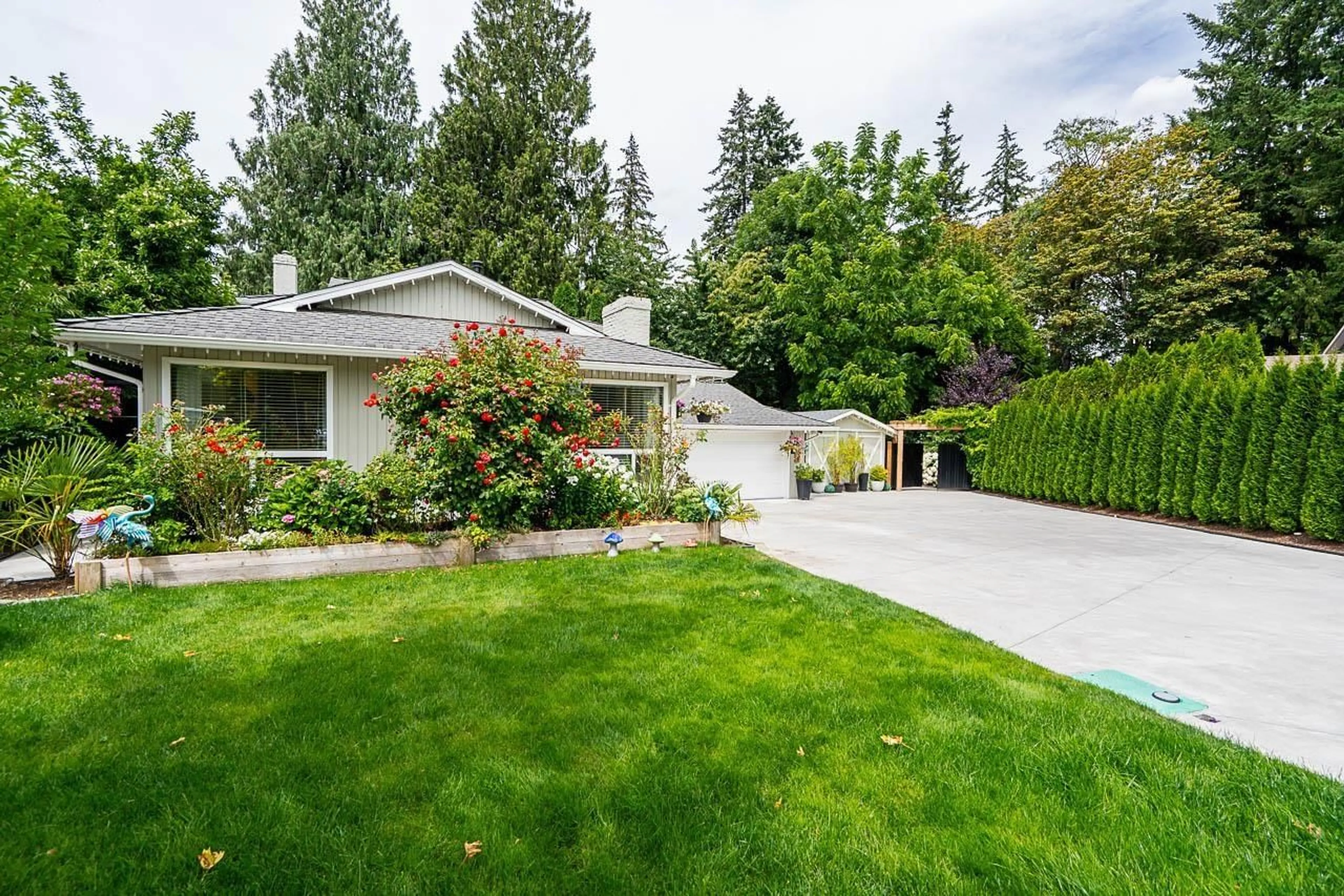 Home with vinyl exterior material, street for 4965 198B STREET, Langley British Columbia V3A6L4