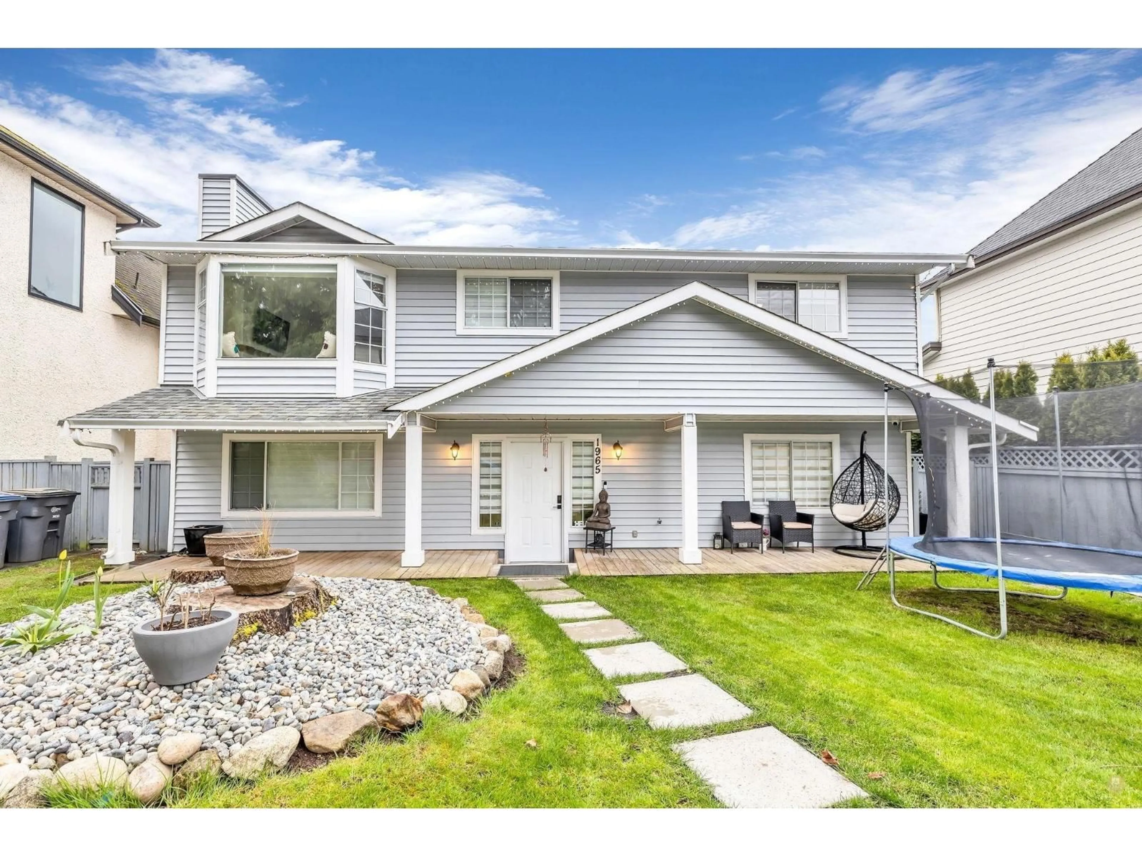 Home with vinyl exterior material, street for 1965 128 STREET, Surrey British Columbia V4A3V5