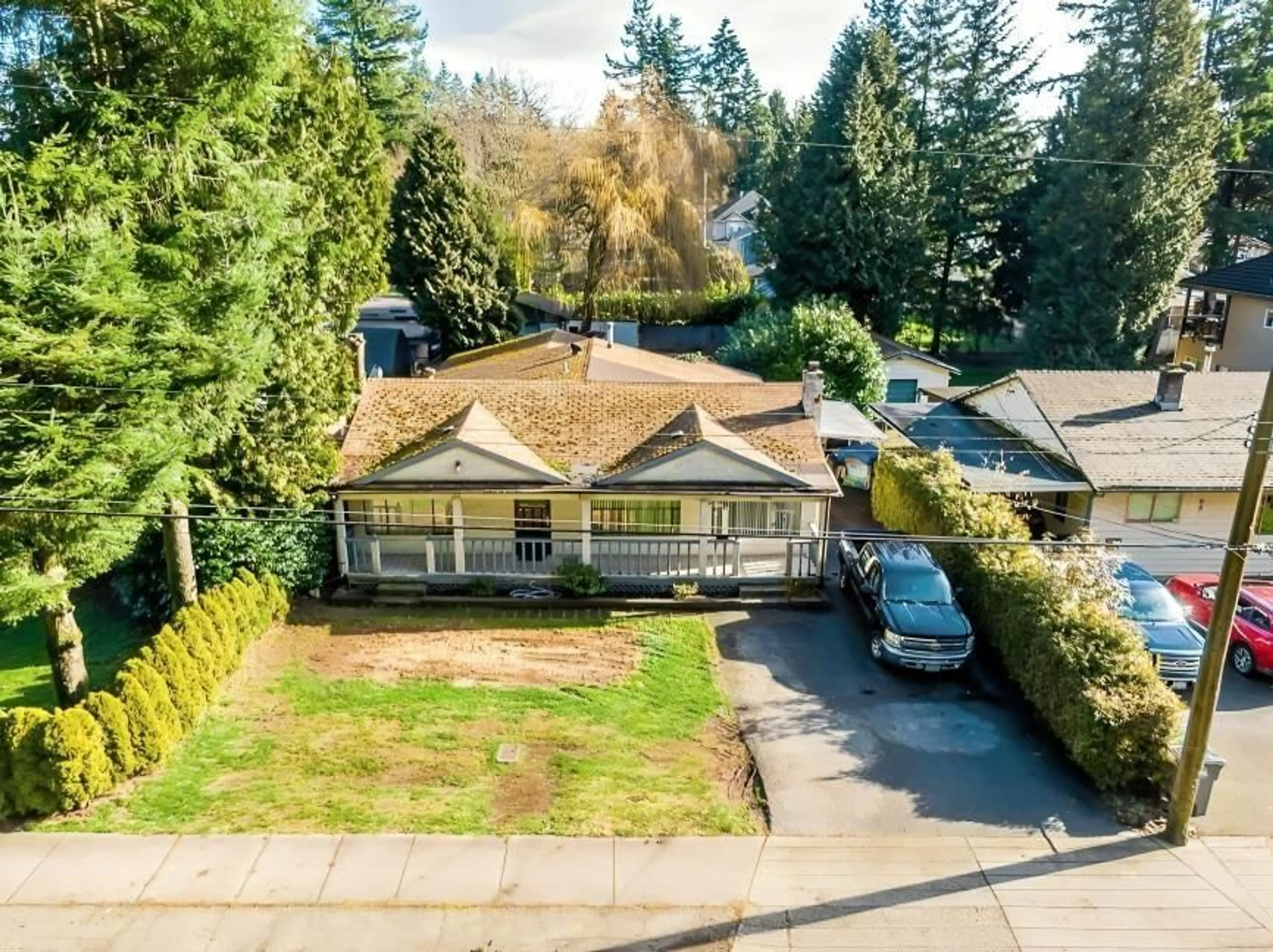 A pic from outside/outdoor area/front of a property/back of a property/a pic from drone, street for 9286 148 STREET, Surrey British Columbia V3R3W8