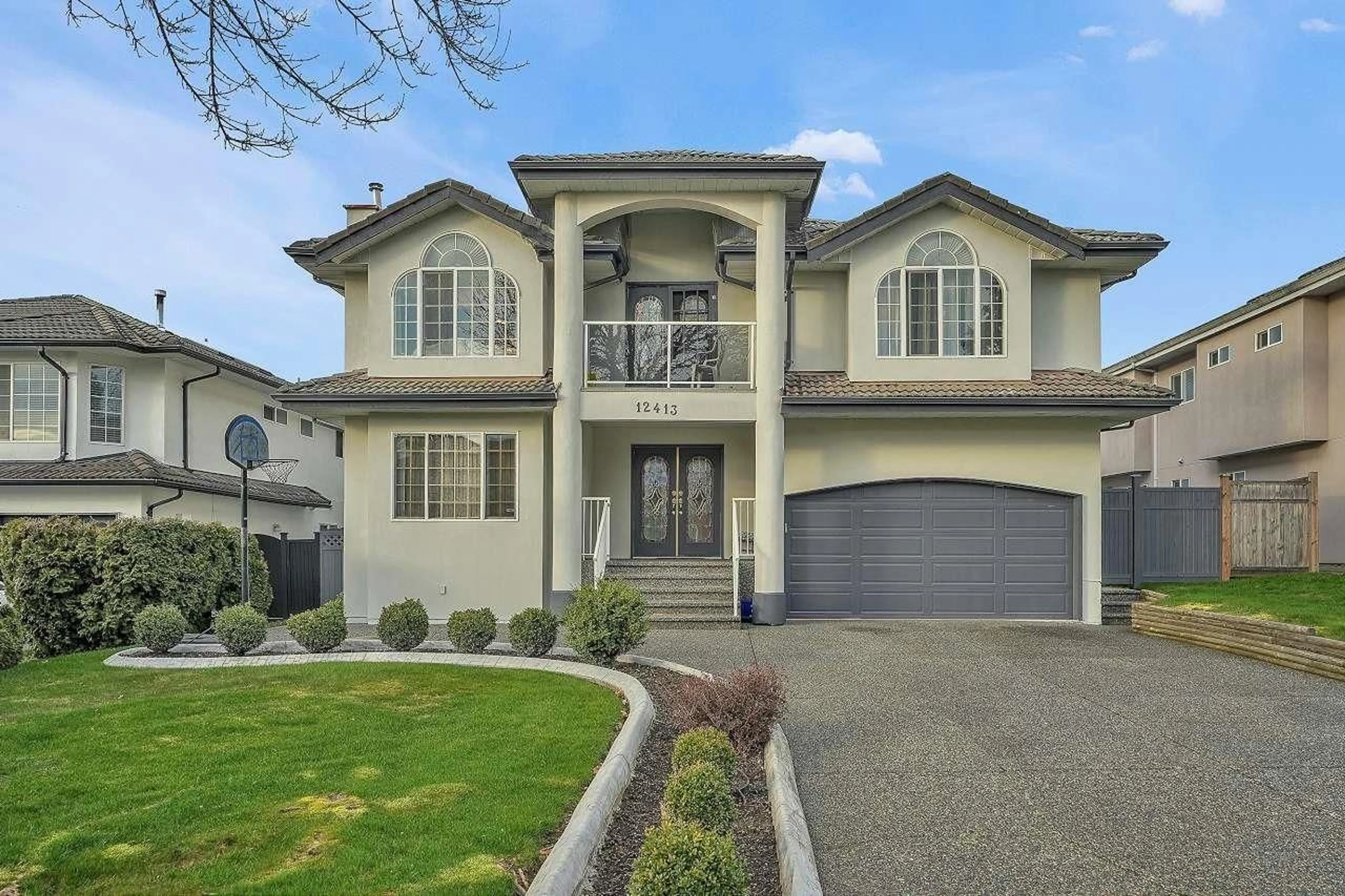 Home with vinyl exterior material, street for 12413 64A AVENUE, Surrey British Columbia V3W5Y1