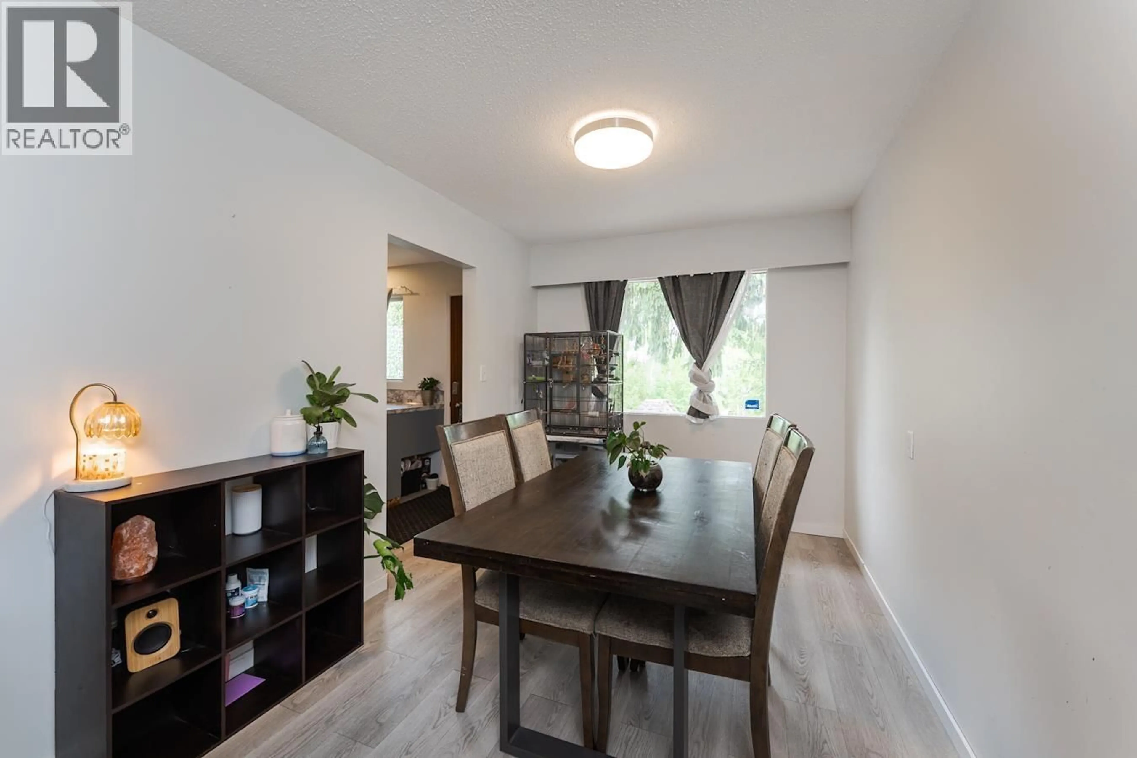 Dining room, wood/laminate floor for 138 MCLEAN DRIVE, Prince George British Columbia V2M4R3