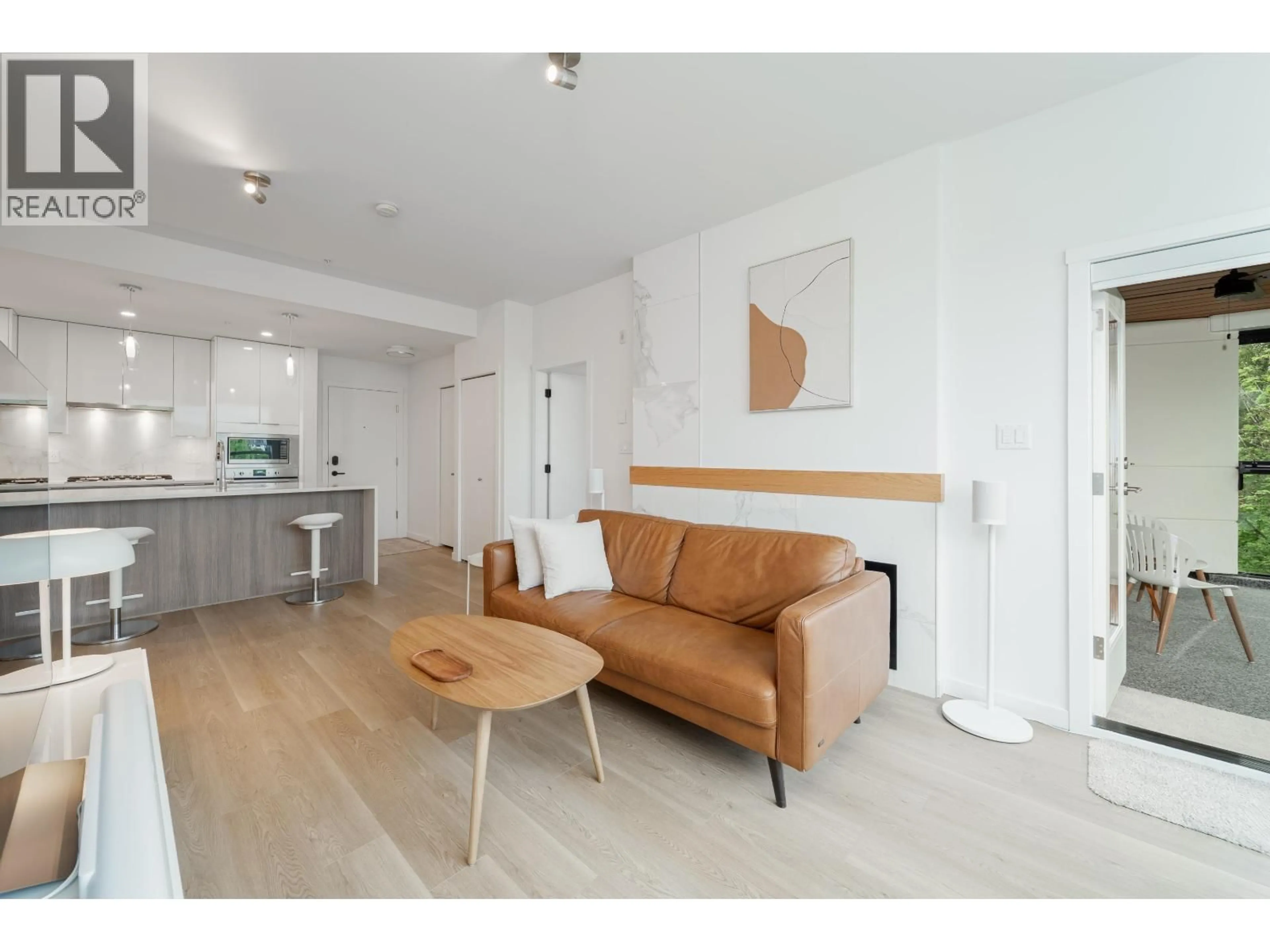 Living room with furniture, wood/laminate floor for 413 - 11641 227 STREET, Maple Ridge British Columbia V2X9J6