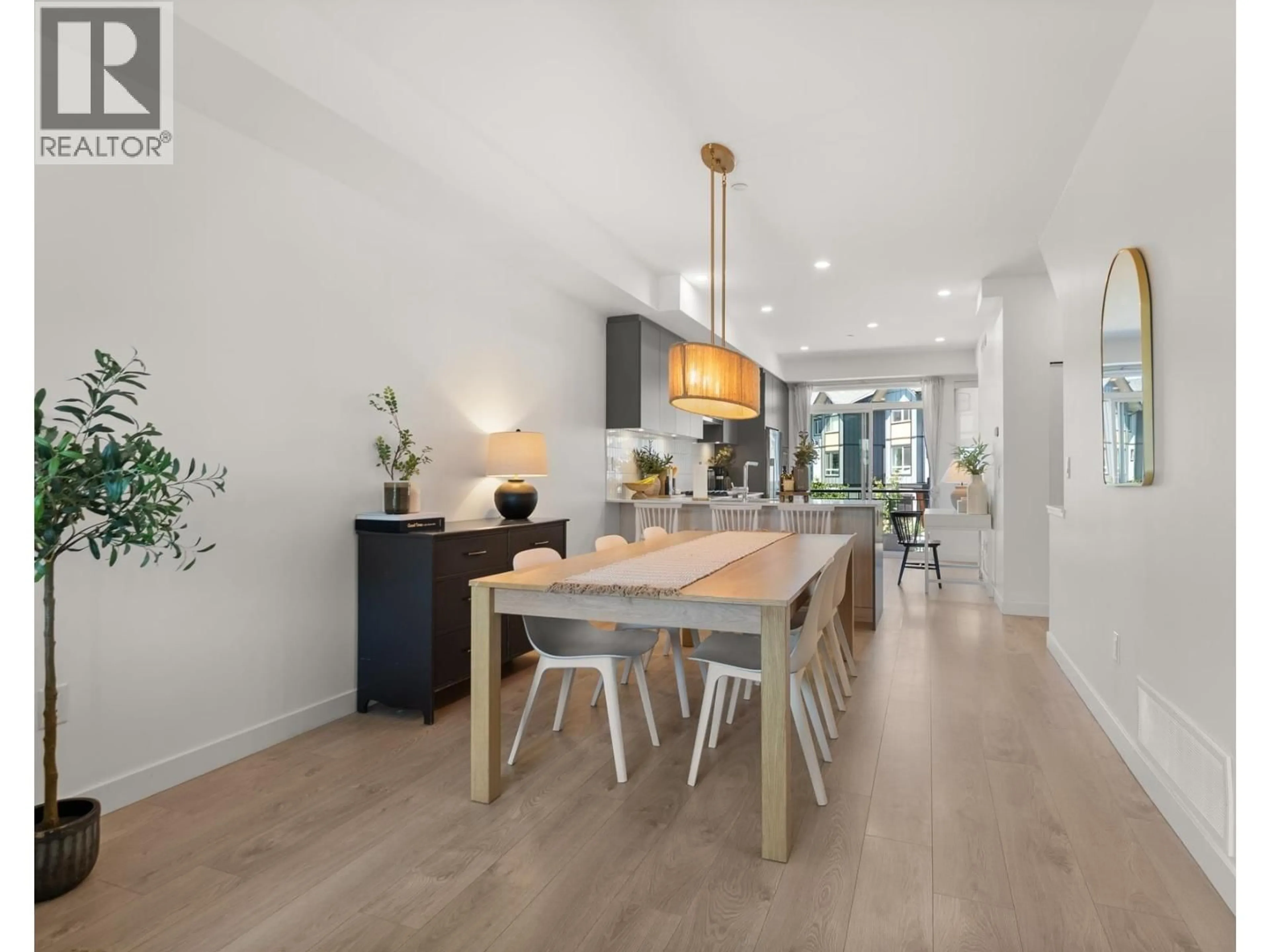 Open concept kitchen, wood/laminate floor for 10 - 4375 CORMORANT WAY, Tsawwassen British Columbia V4M0G3