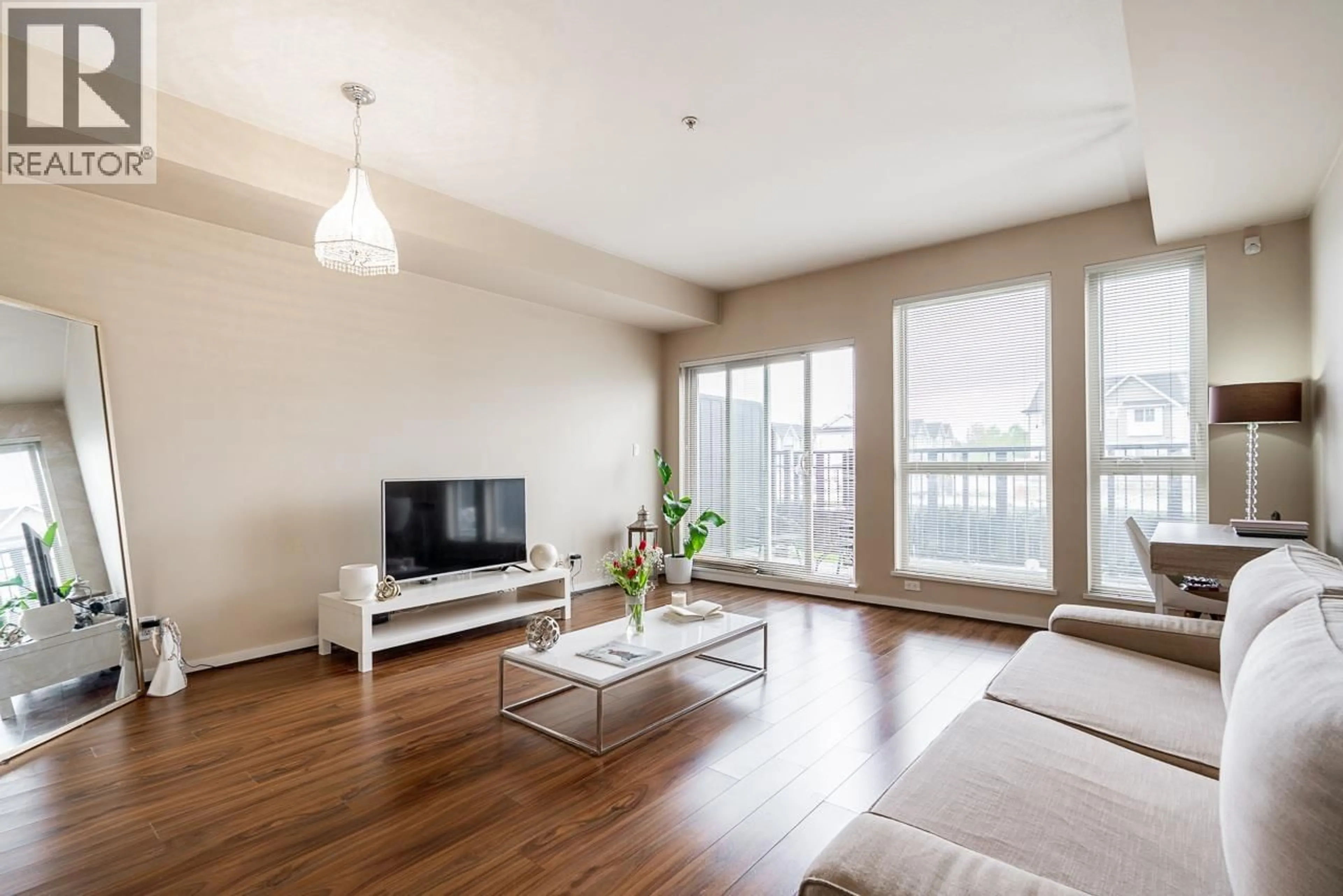 Living room with furniture, wood/laminate floor for 161 - 4099 STOLBERG STREET, Richmond British Columbia V6X0J4