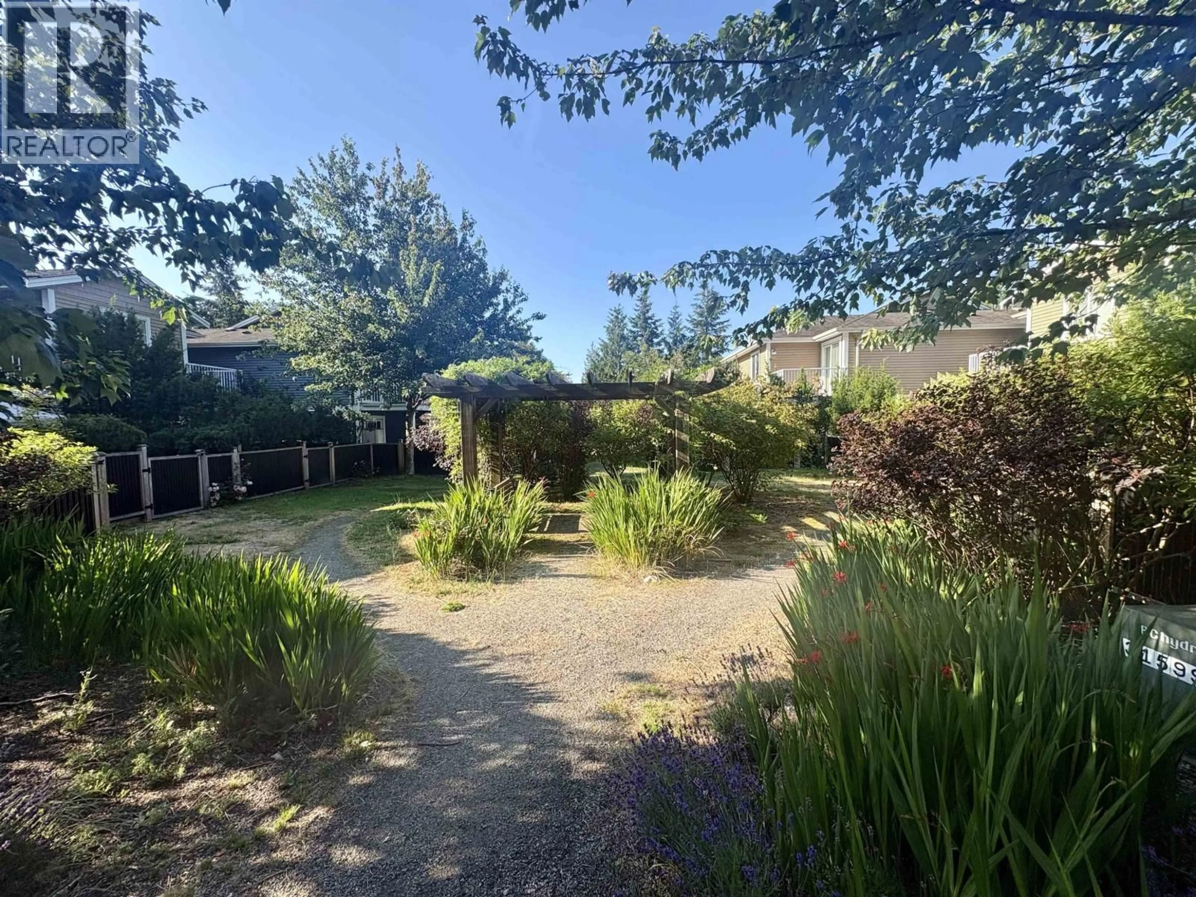 A pic from outside/outdoor area/front of a property/back of a property/a pic from drone, street for 16 - 624 SHAW ROAD, Gibsons British Columbia V0N1V8