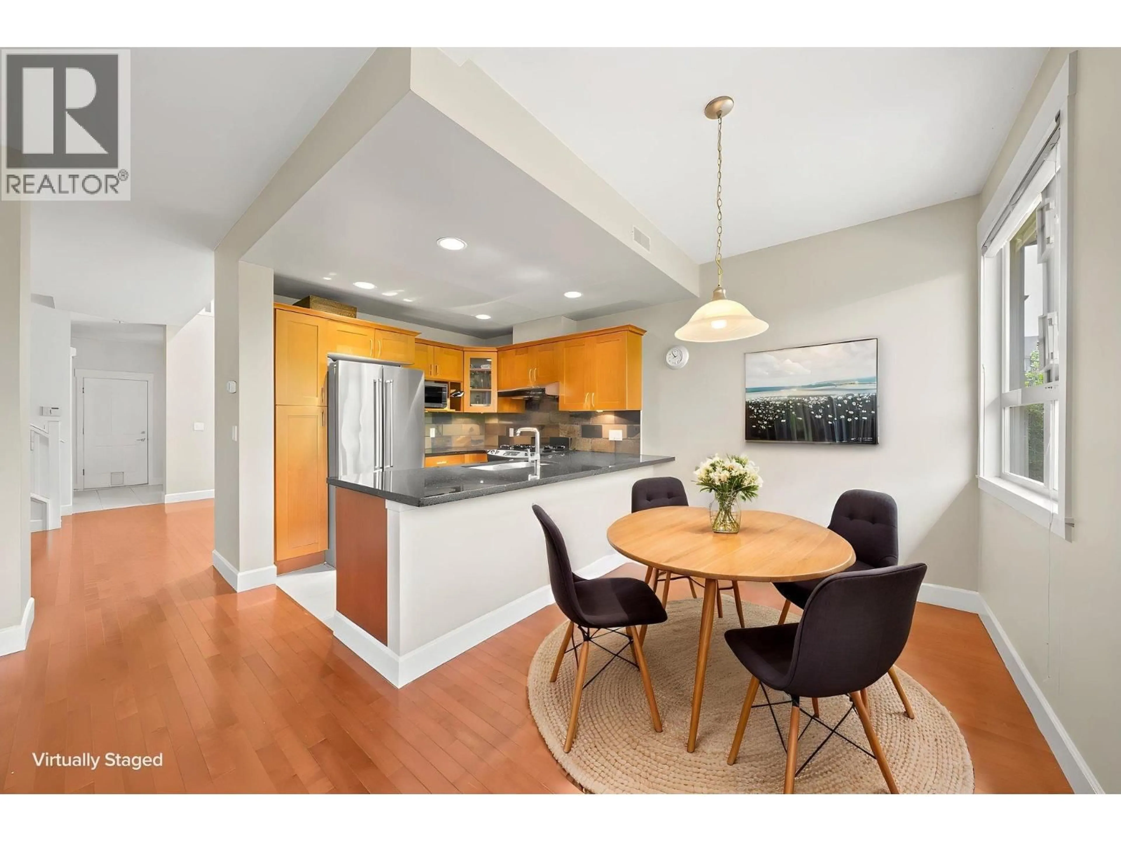 Open concept kitchen, wood/laminate floor for 17 - 6300 BIRCH STREET, Richmond British Columbia V6Y4K3