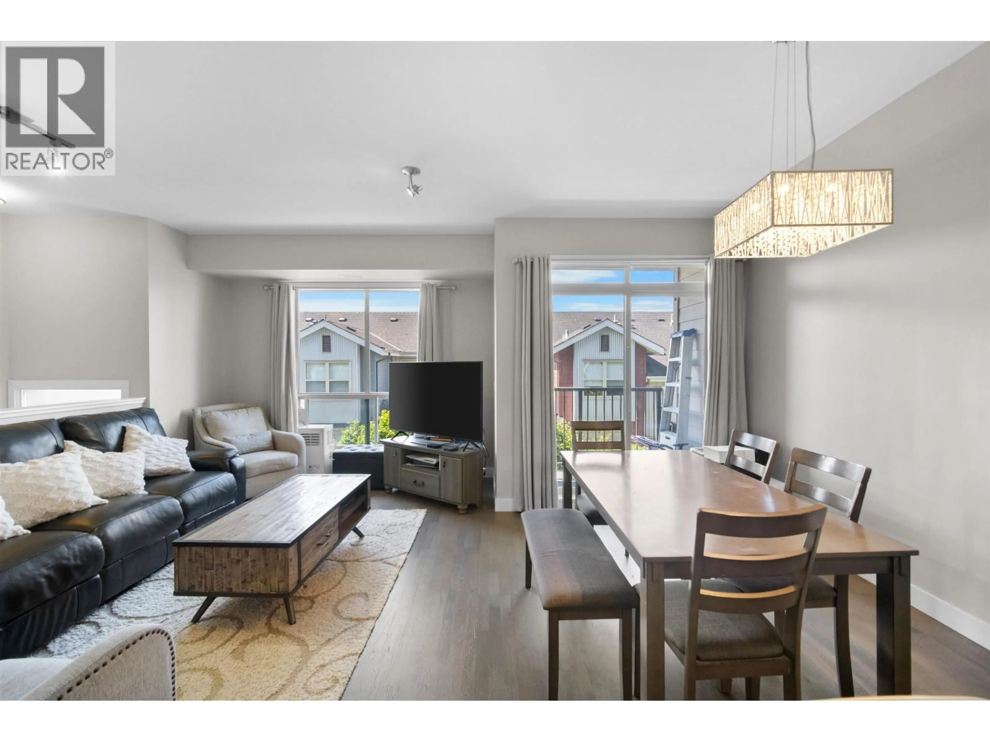 Living room with furniture, wood/laminate floor for 43 - 10133 RIVER DRIVE, Richmond British Columbia V6X0K8