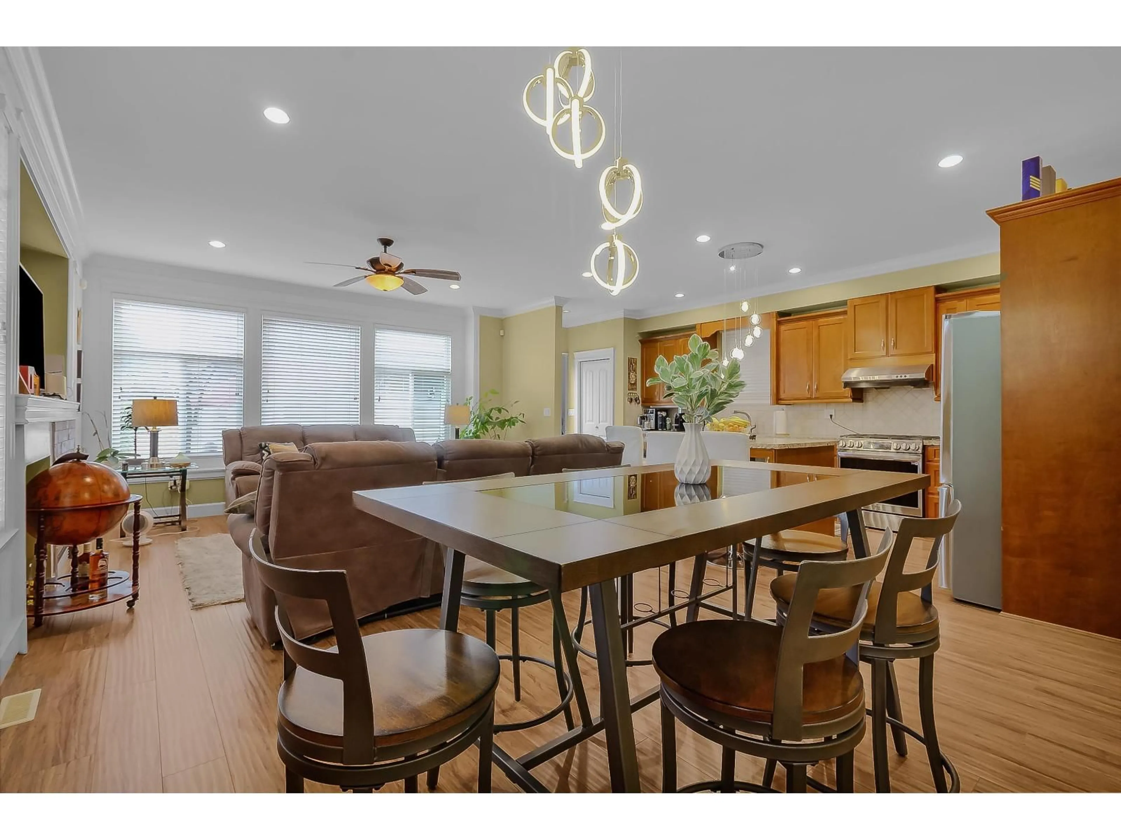 Open concept kitchen, wood/laminate floor for 19913 72 AVENUE, Langley British Columbia V2Y3J2