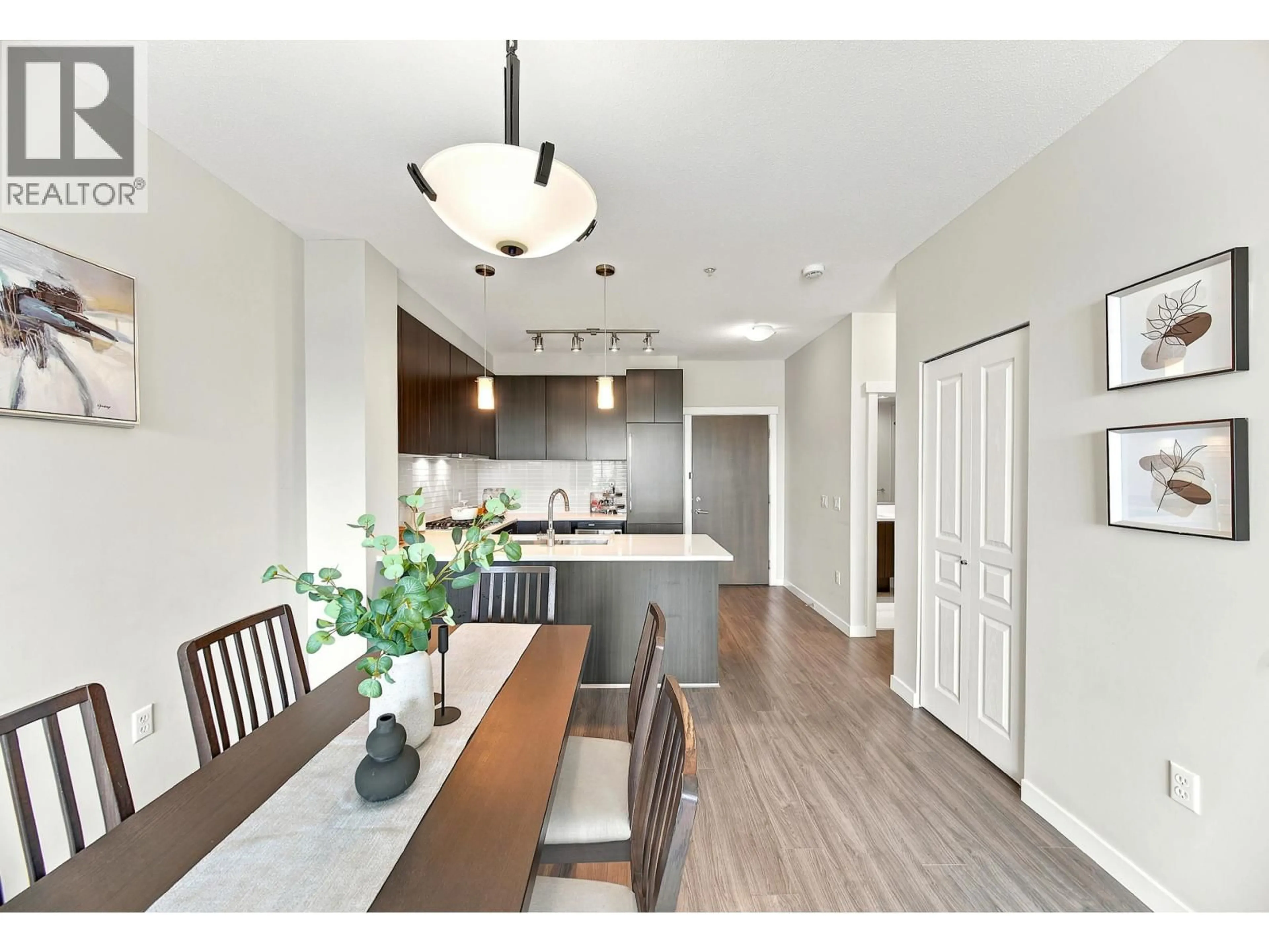 Open concept kitchen, wood/laminate floor for 613 - 9399 ALEXANDRA ROAD, Richmond British Columbia V6X0L7