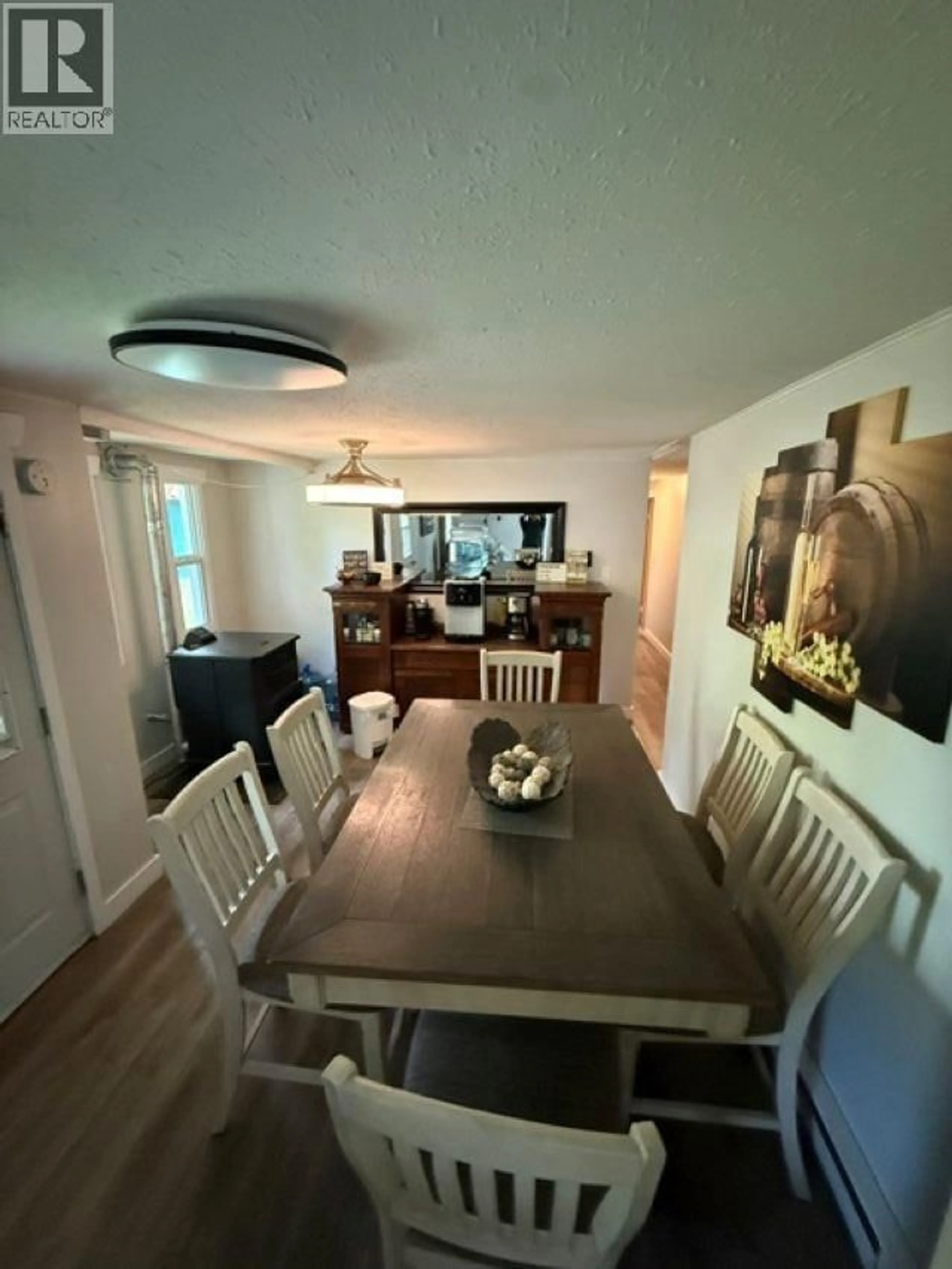 Dining room, wood/laminate floor for 11423 BALD HILL ROAD, Burns Lake British Columbia V0J1E2