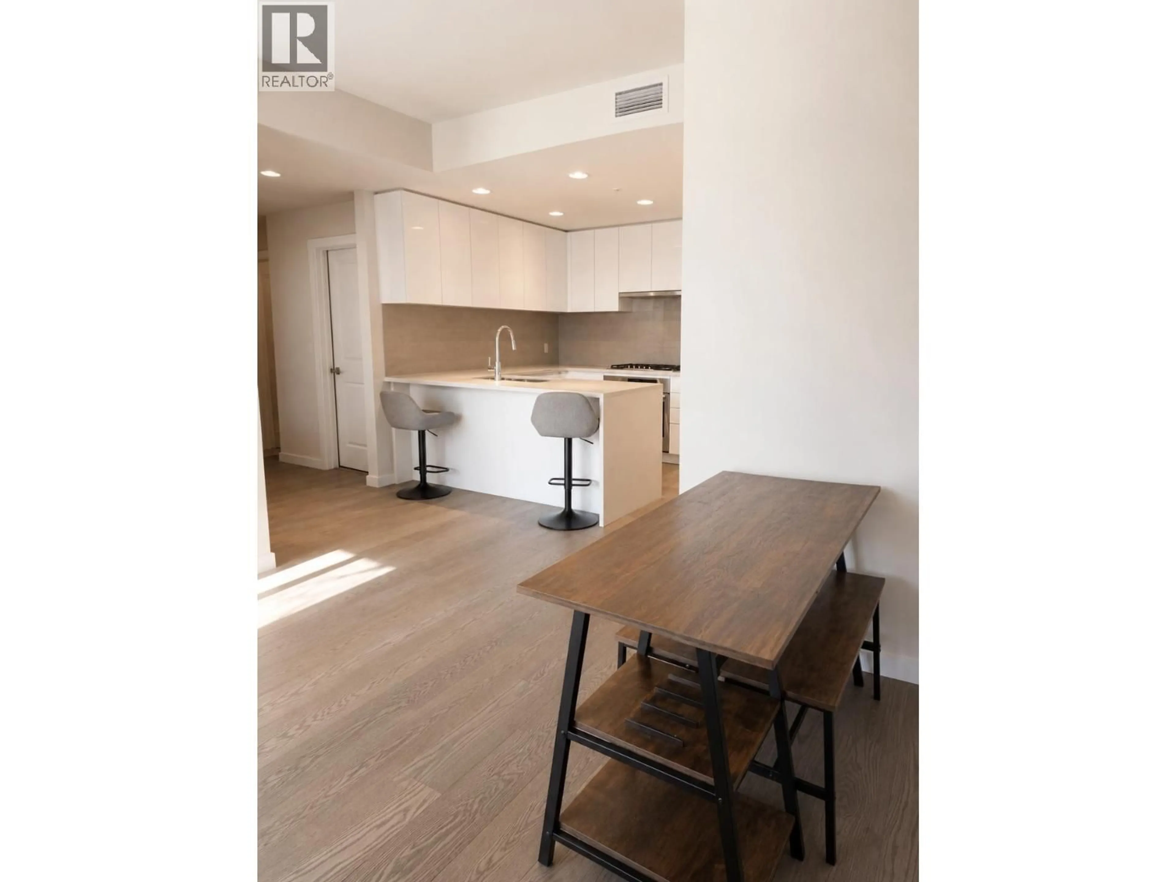 Open concept kitchen, wood/laminate floor for 501 - 3533 ROSS DRIVE, Vancouver British Columbia V6S0L3