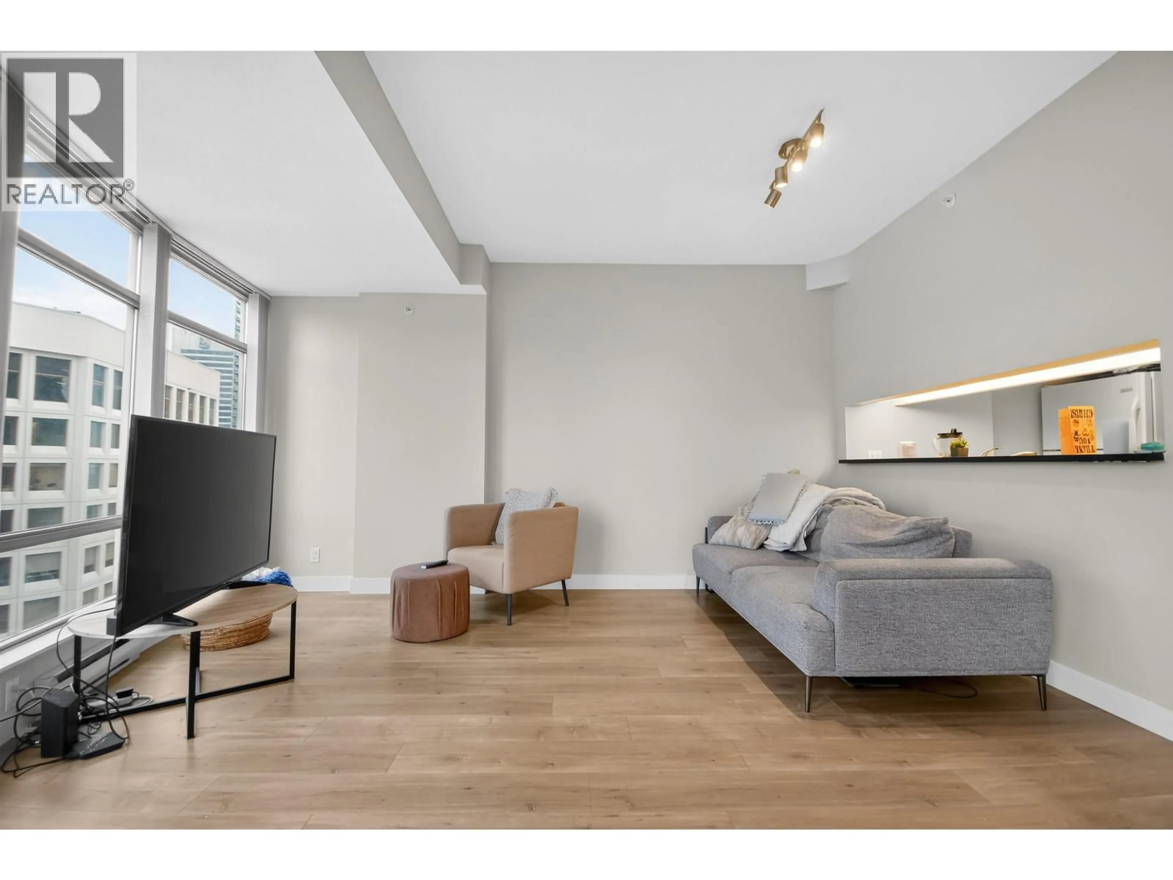 Living room with furniture, wood/laminate floor for 2205 - 1200 ALBERNI STREET, Vancouver British Columbia V6E1A6