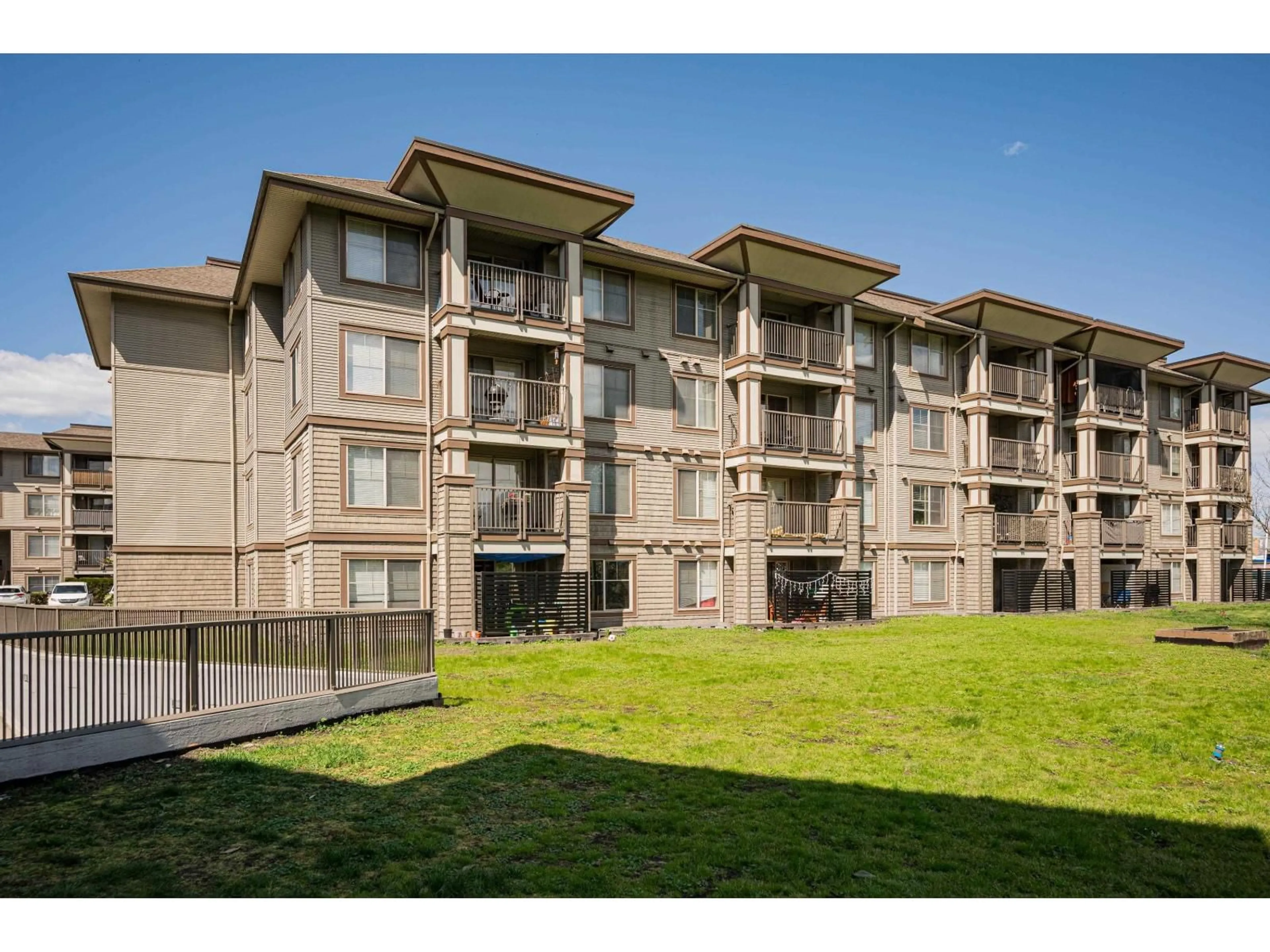 A pic from outside/outdoor area/front of a property/back of a property/a pic from drone, unknown for 408 - 45561 YALE ROAD, Chilliwack British Columbia V2P0A8