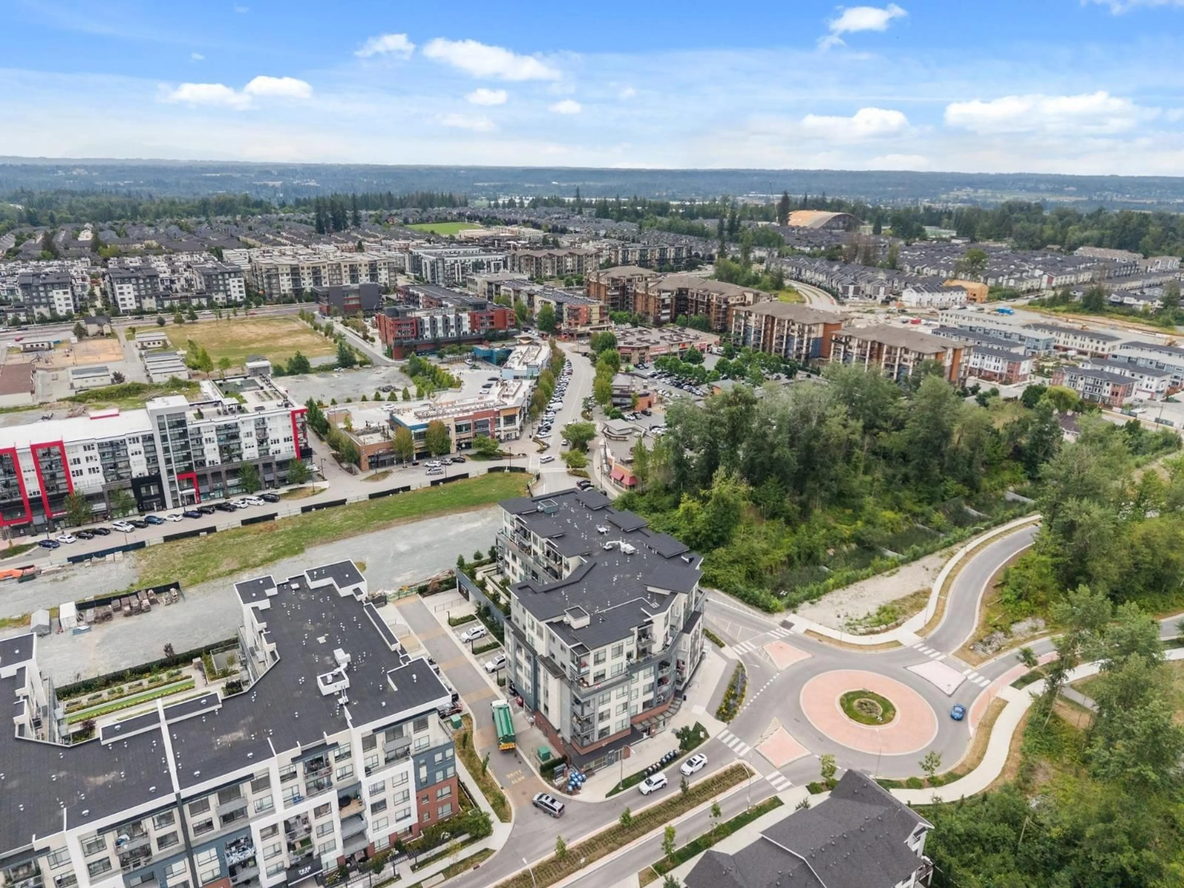 A pic from outside/outdoor area/front of a property/back of a property/a pic from drone, city buildings view from balcony for 401 - 7920 206 STREET, Langley British Columbia V2Y3X1