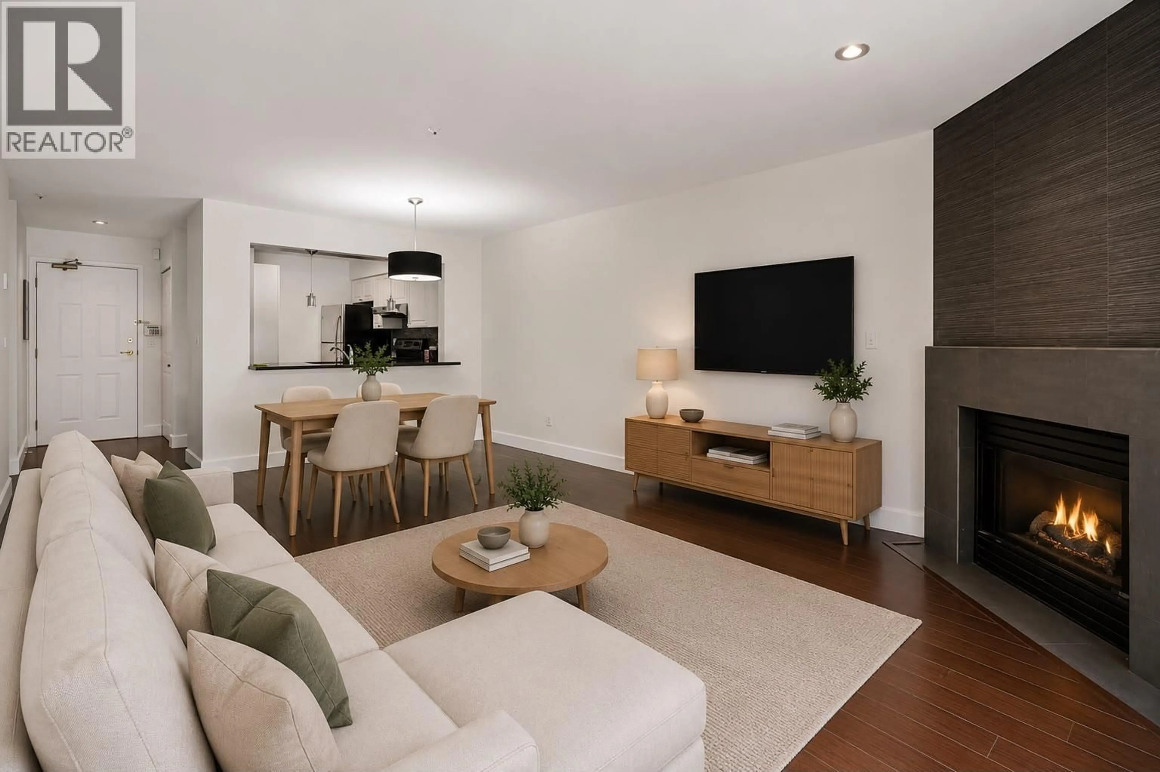 Living room with furniture, wood/laminate floor for 102 - 2965 HORLEY STREET, Vancouver British Columbia V5R6B9