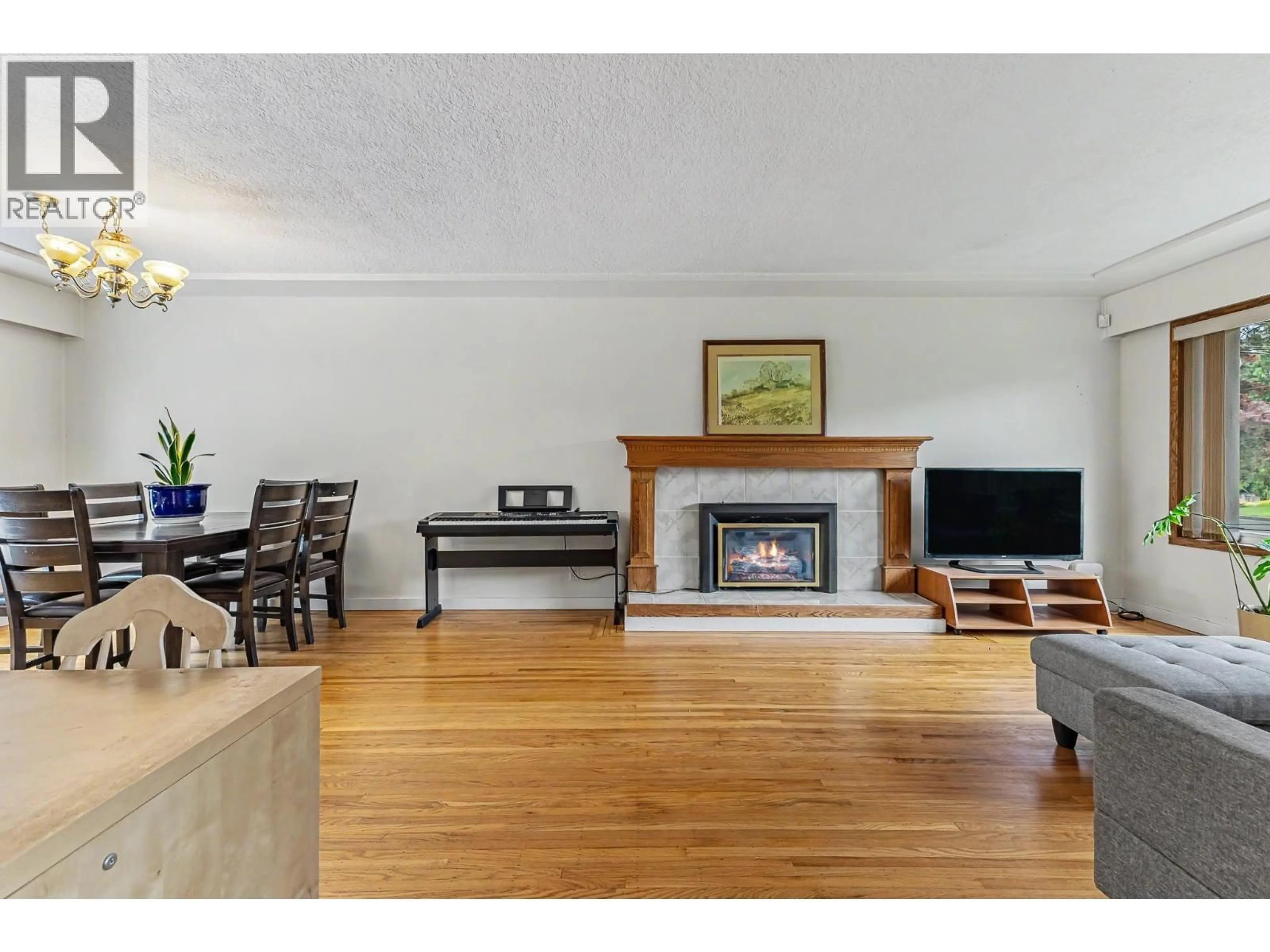 Living room with furniture, wood/laminate floor for 1684 CORNELL AVENUE, Coquitlam British Columbia V3J3A1