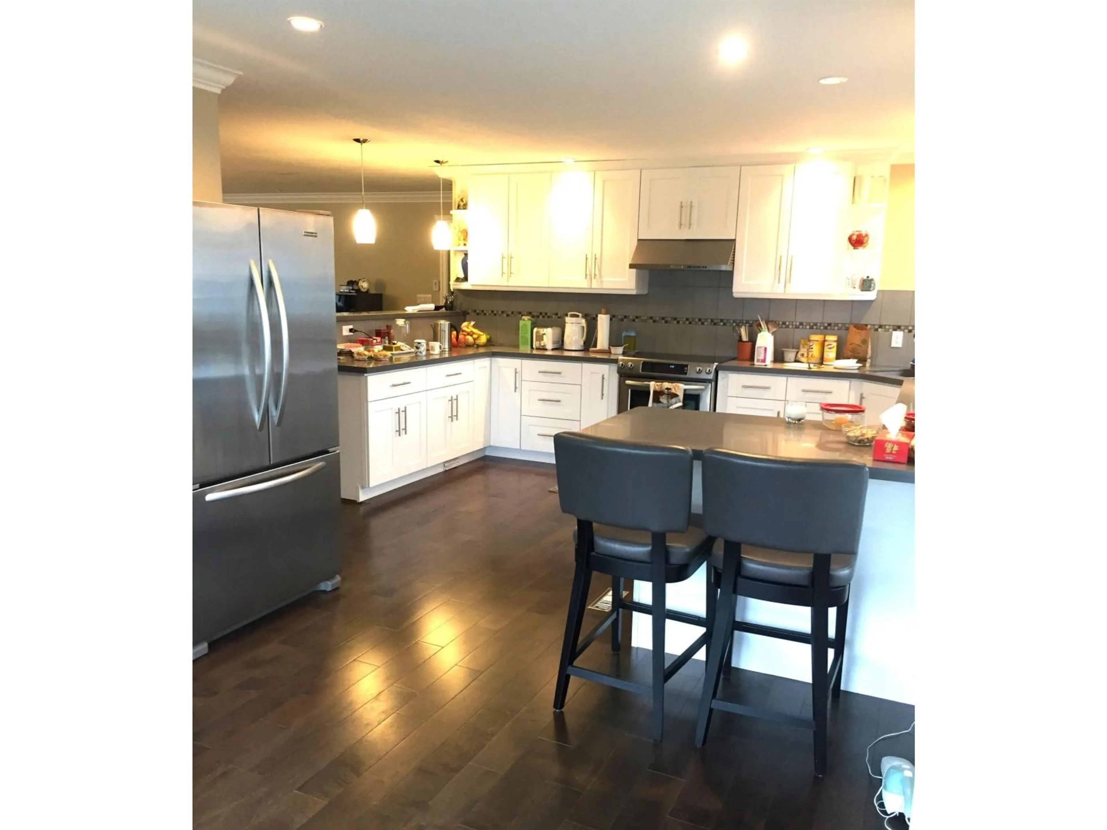 Open concept kitchen, wood/laminate floor for 12922 19A AVENUE, Surrey British Columbia V4A8P1