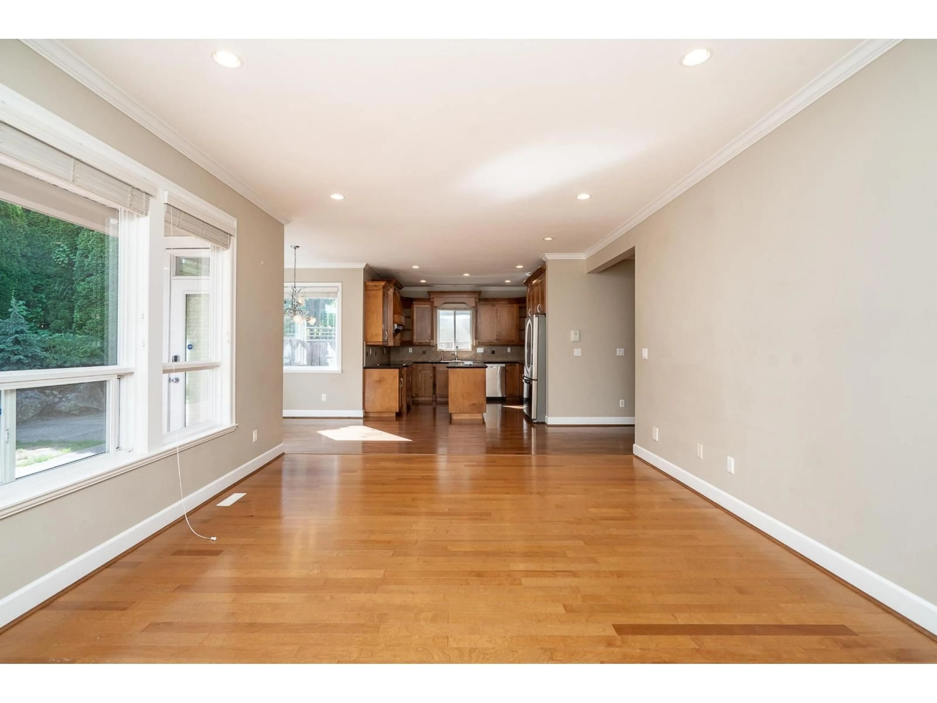 Open concept kitchen, wood/laminate floor for 3782 154 STREET, Surrey British Columbia V3Z0V2