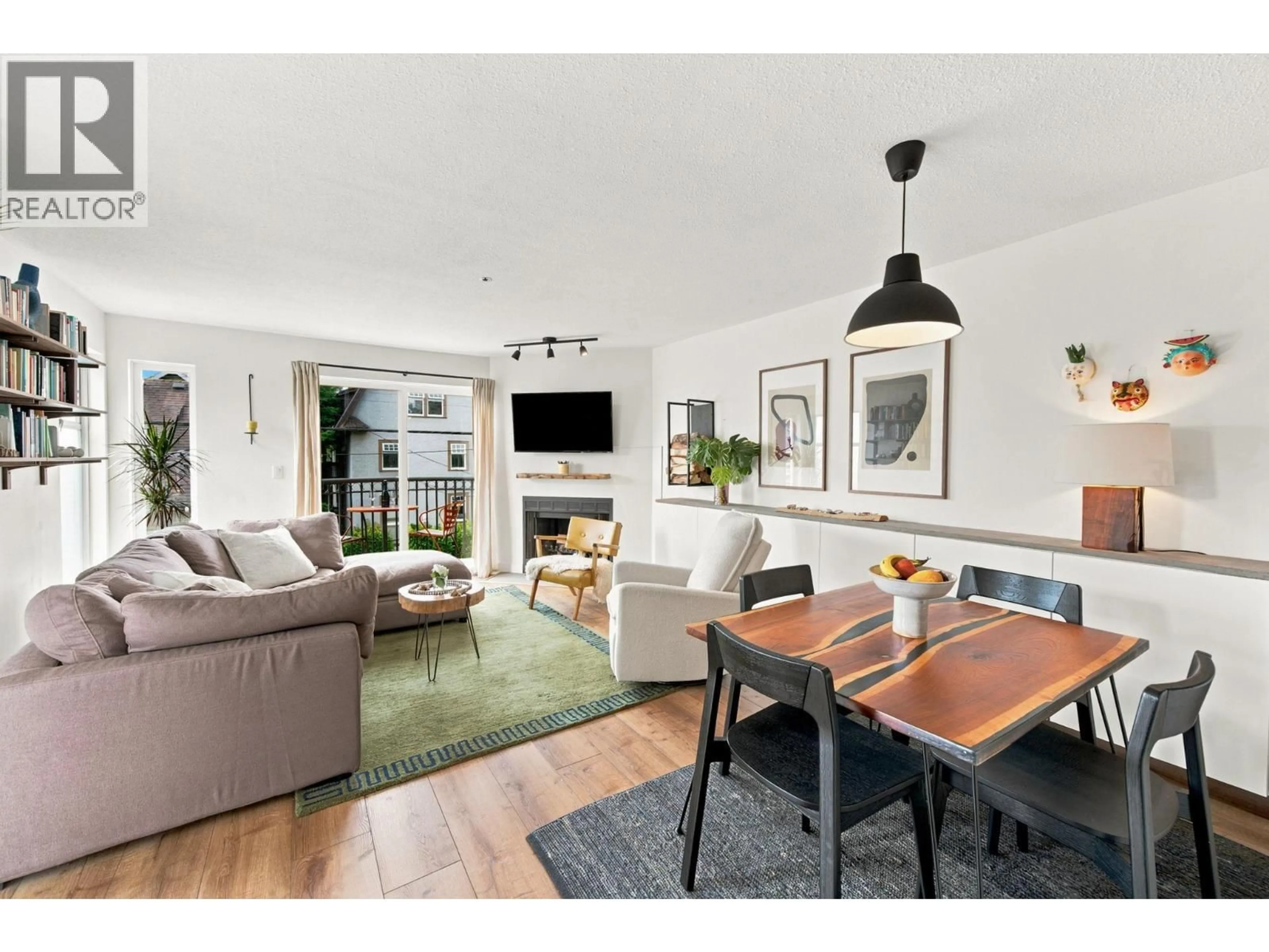Living room with furniture, wood/laminate floor for 304 - 888 13TH AVENUE, Vancouver British Columbia V5Z1P2