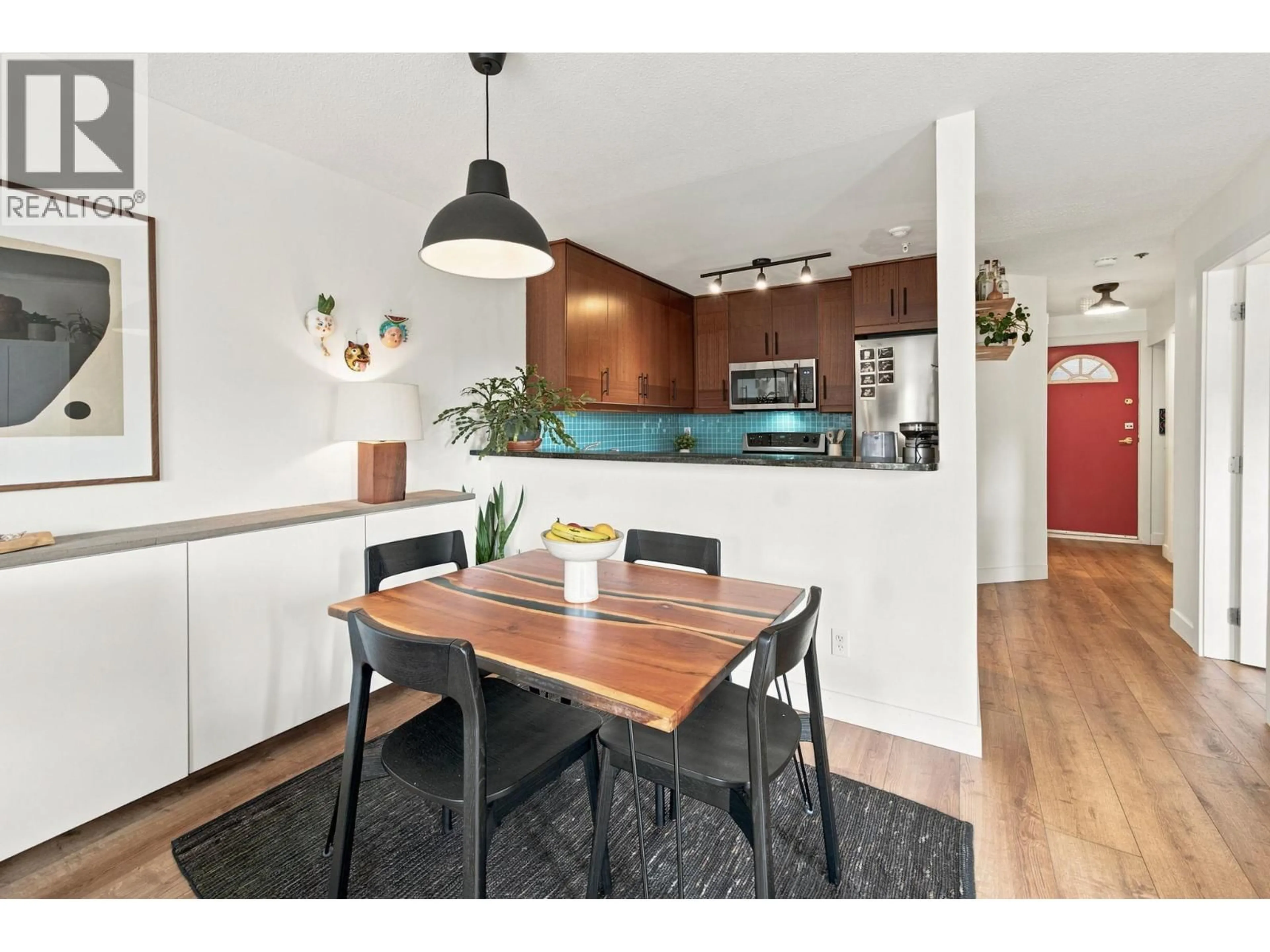 Open concept kitchen, wood/laminate floor for 304 - 888 13TH AVENUE, Vancouver British Columbia V5Z1P2