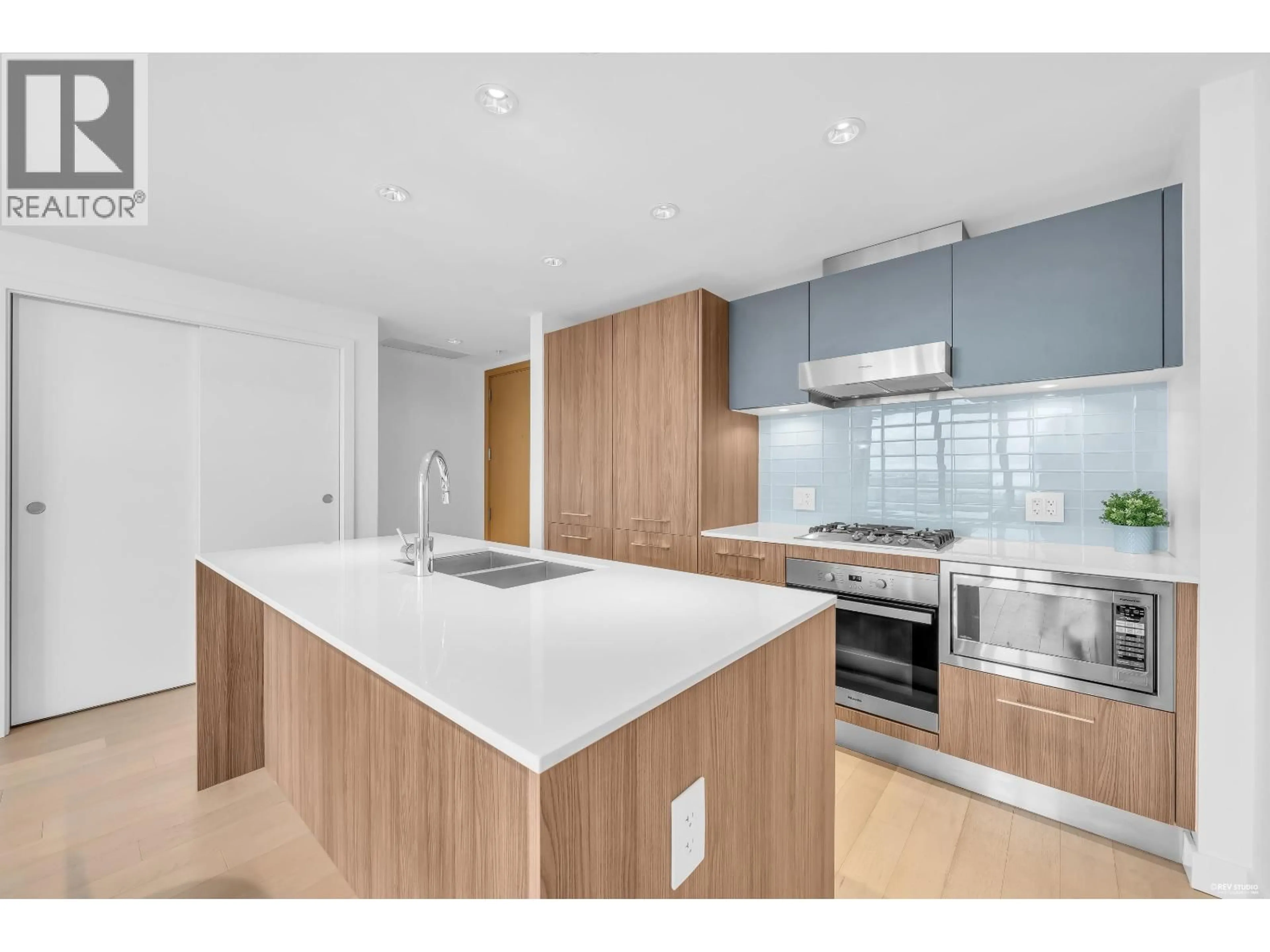 Open concept kitchen, wood/laminate floor for 1105 - 4638 GLADSTONE STREET, Vancouver British Columbia V5N0G5