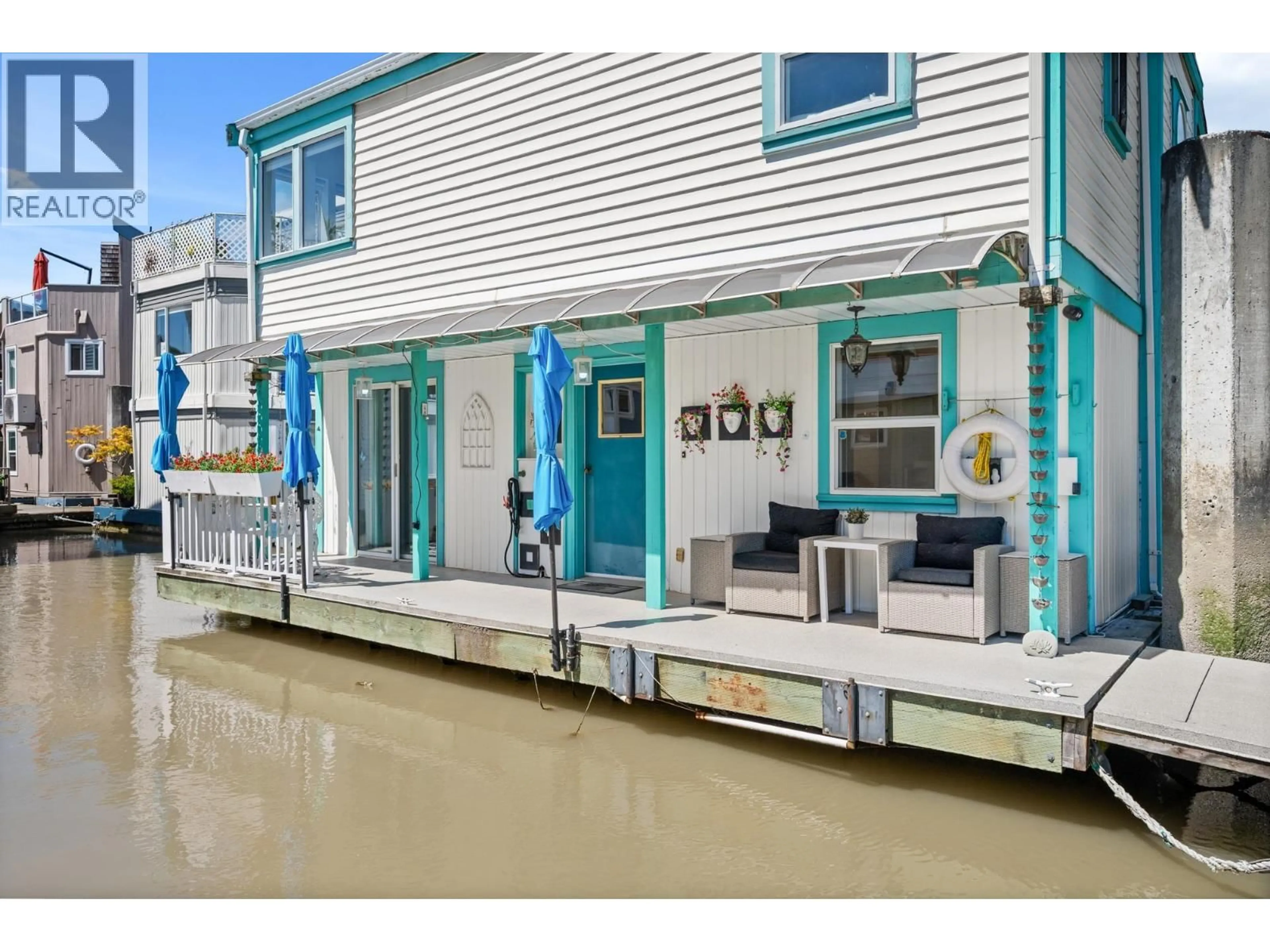 Home with vinyl exterior material, water/lake/river/ocean view for 1 - 3459 RIVER ROAD, Delta British Columbia V4K4Y6