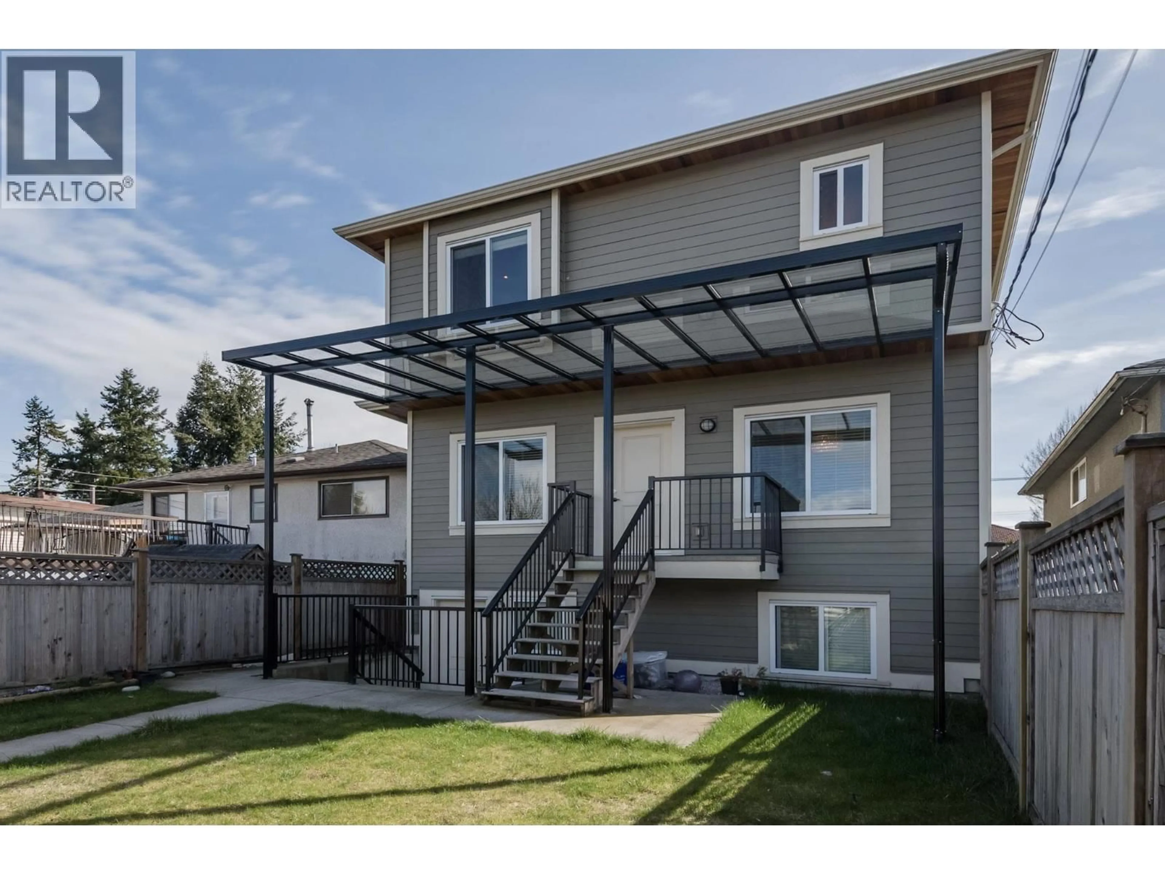 Home with vinyl exterior material, street for 2627 41ST AVENUE, Vancouver British Columbia V5R2W6