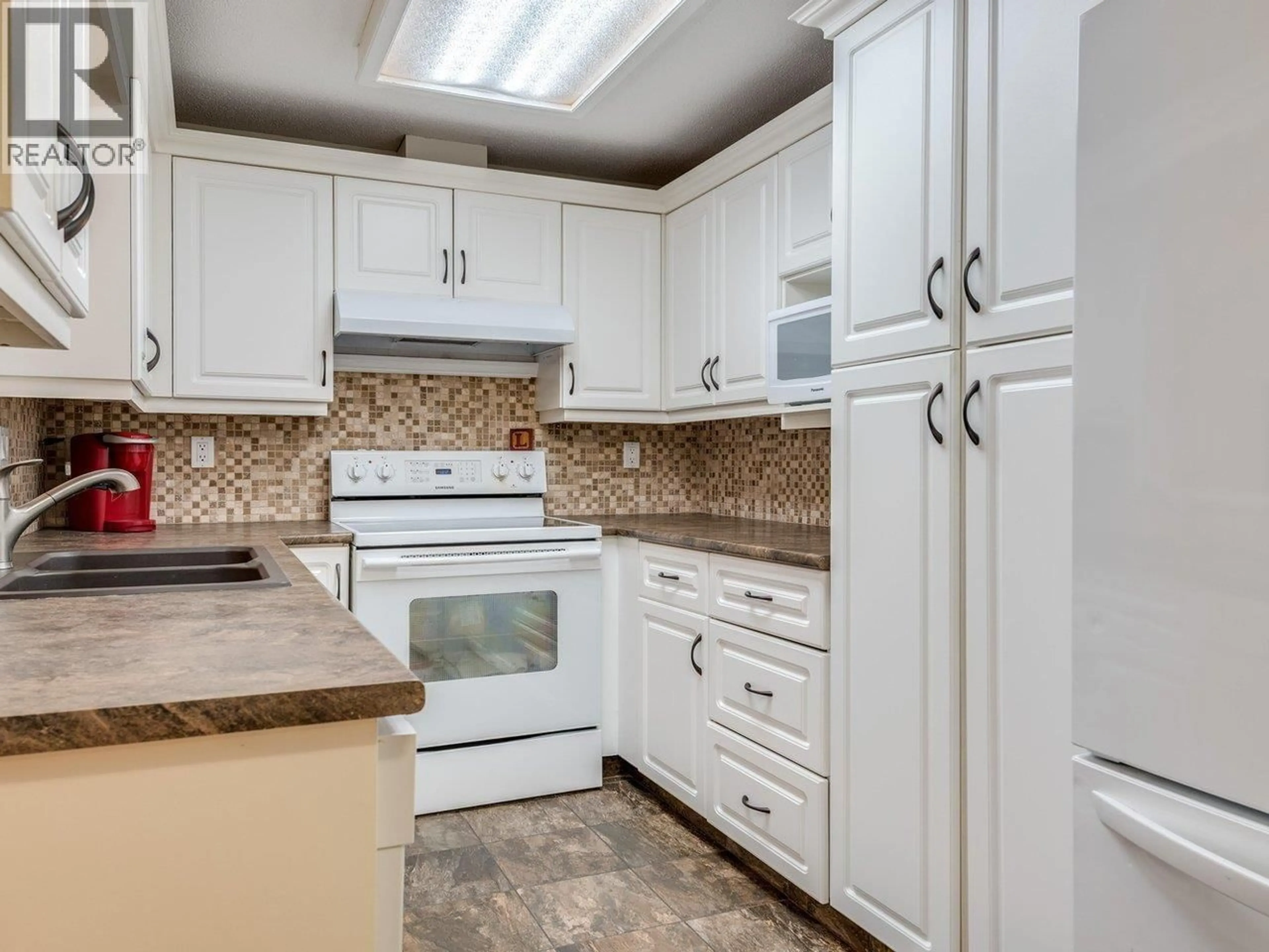 Standard kitchen, ceramic/tile floor for B207 - 4821 53 STREET, Ladner British Columbia V4K2Z3