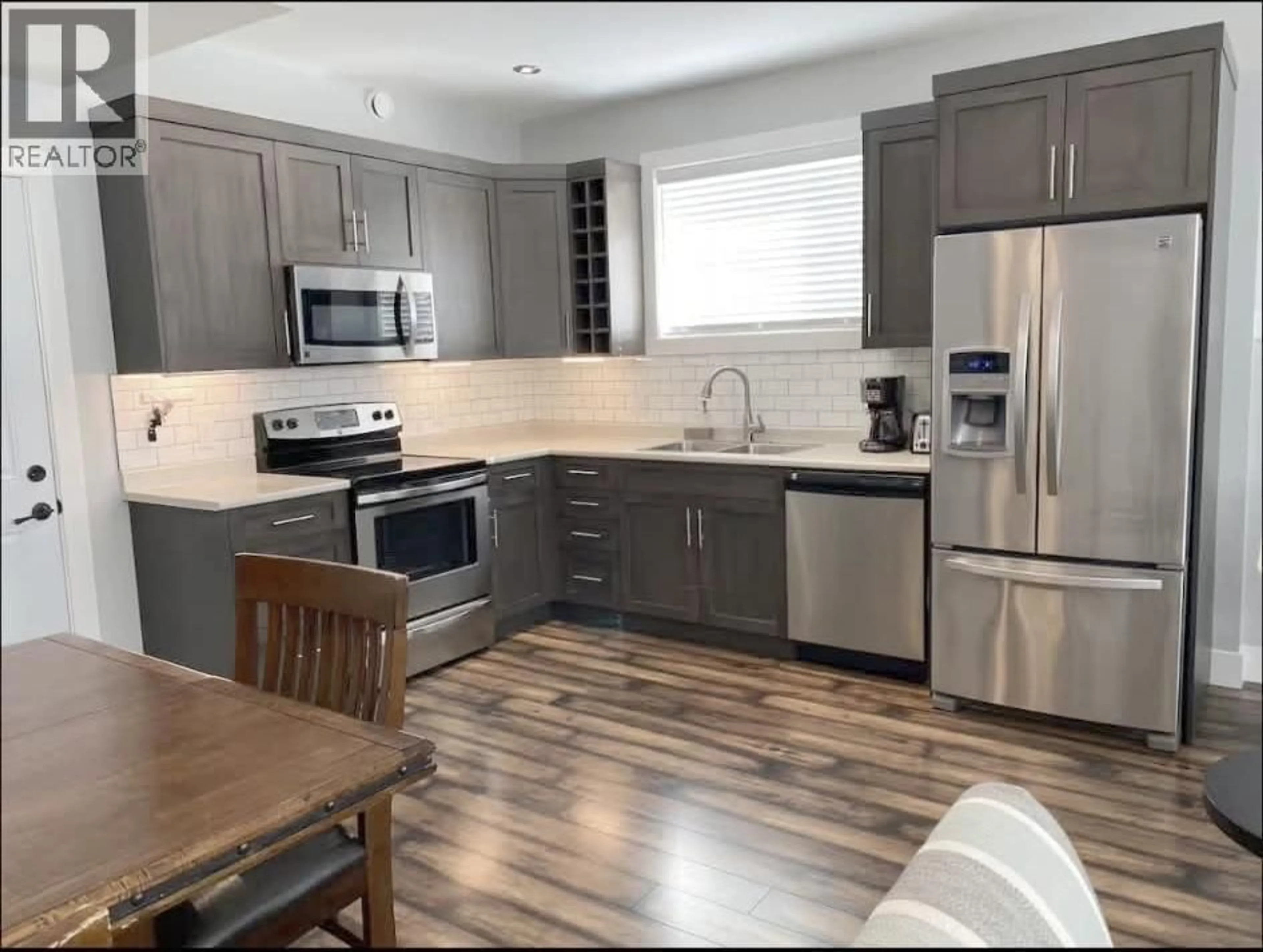 Open concept kitchen, unknown for A - 8311 88 AVENUE, Fort St. John British Columbia V1J0N9