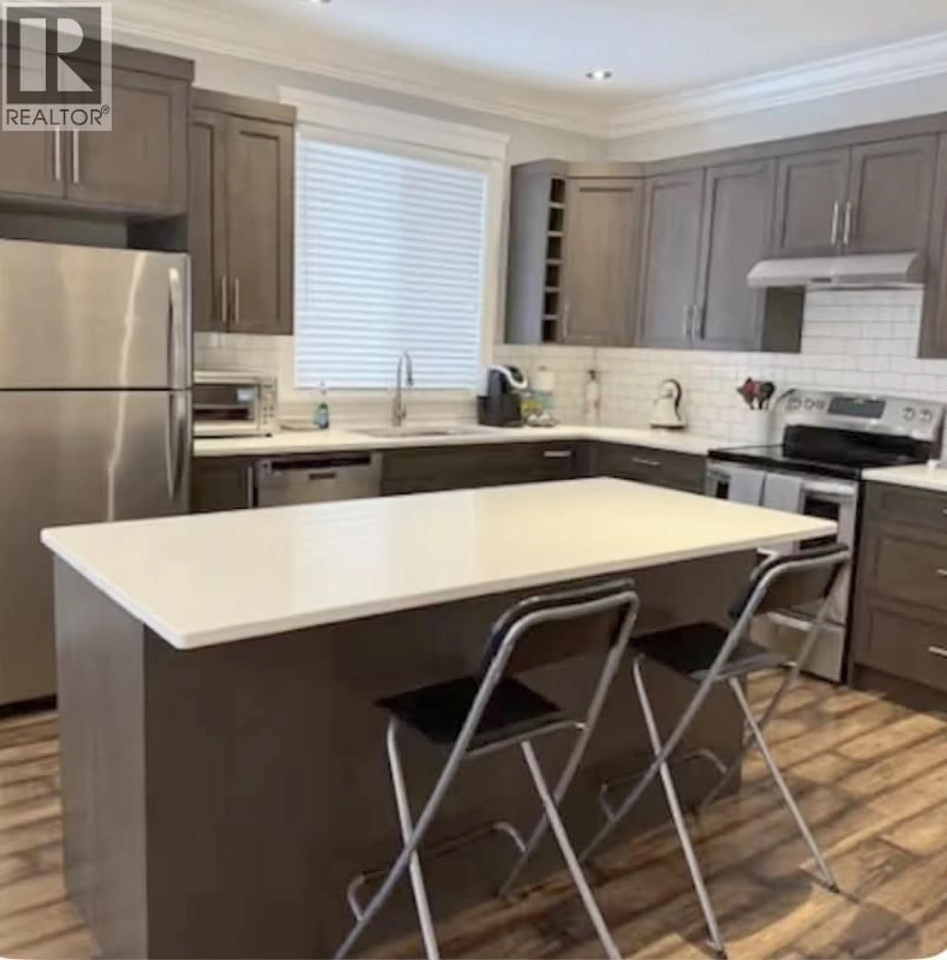 Open concept kitchen, unknown for A - 8311 88 AVENUE, Fort St. John British Columbia V1J0N9