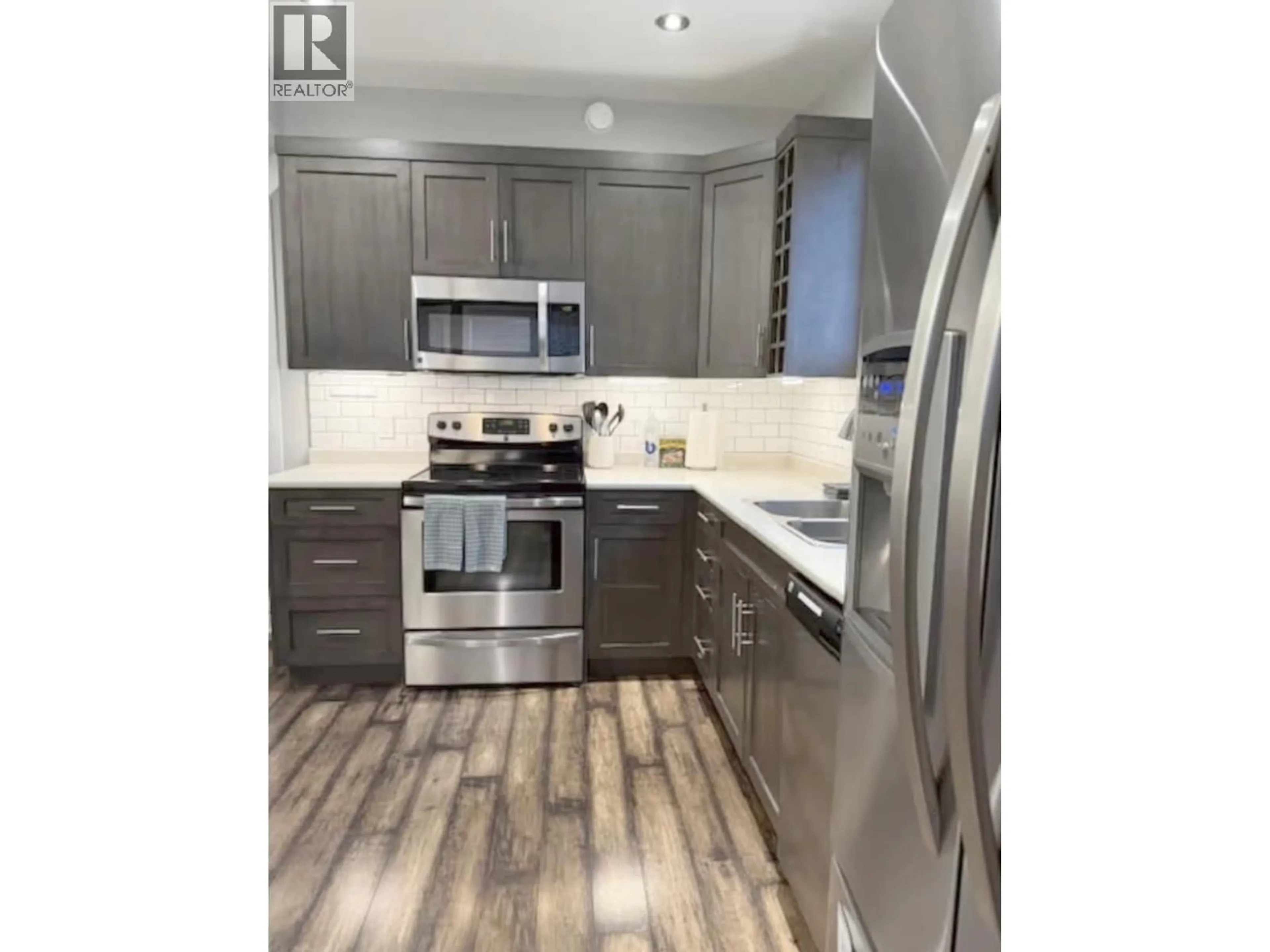 Open concept kitchen, unknown for A - 8311 88 AVENUE, Fort St. John British Columbia V1J0N9