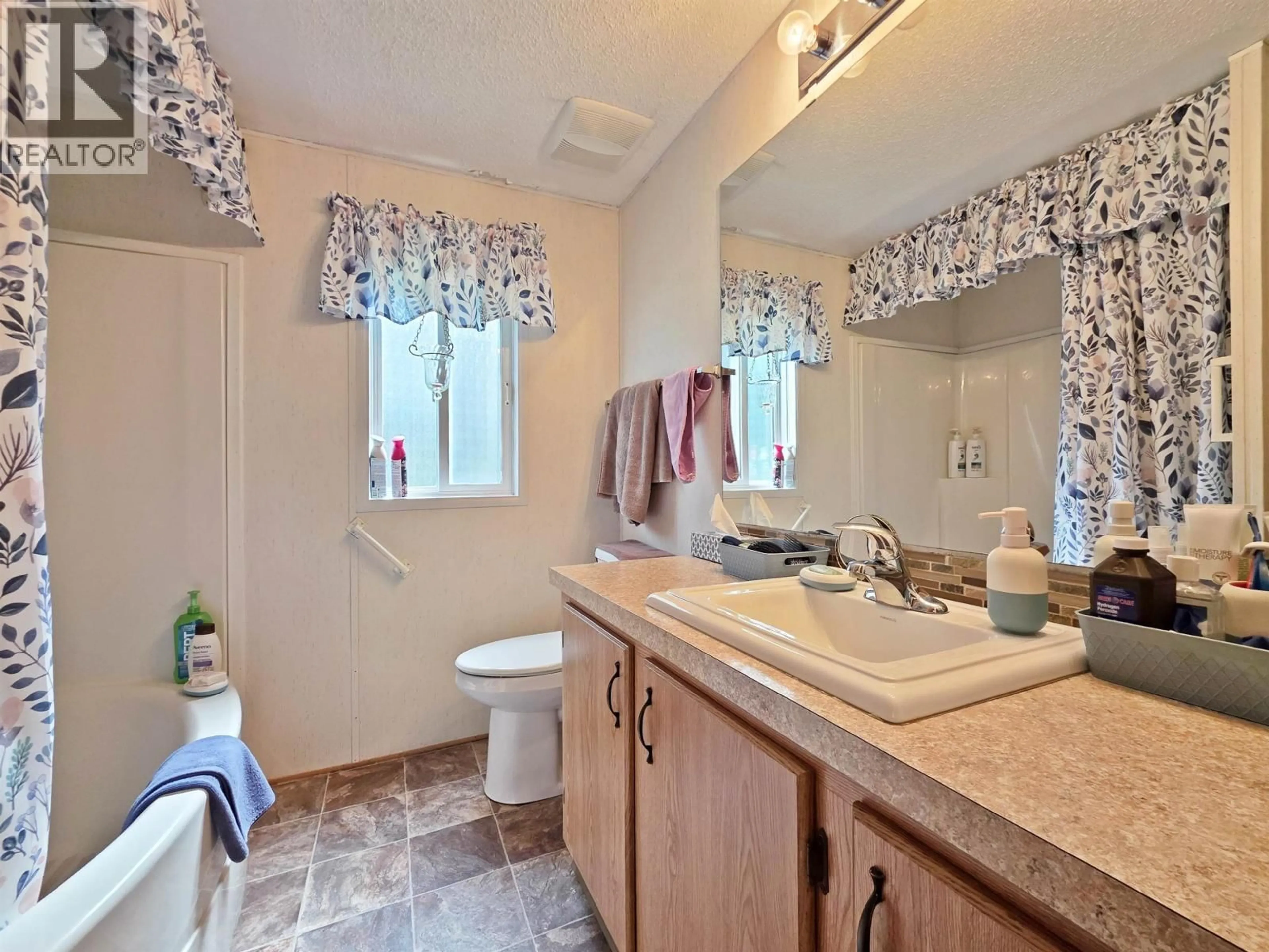 Standard bathroom, ceramic/tile floor for 838 QUESNEL CANYON ROAD, Quesnel British Columbia V2J6S4