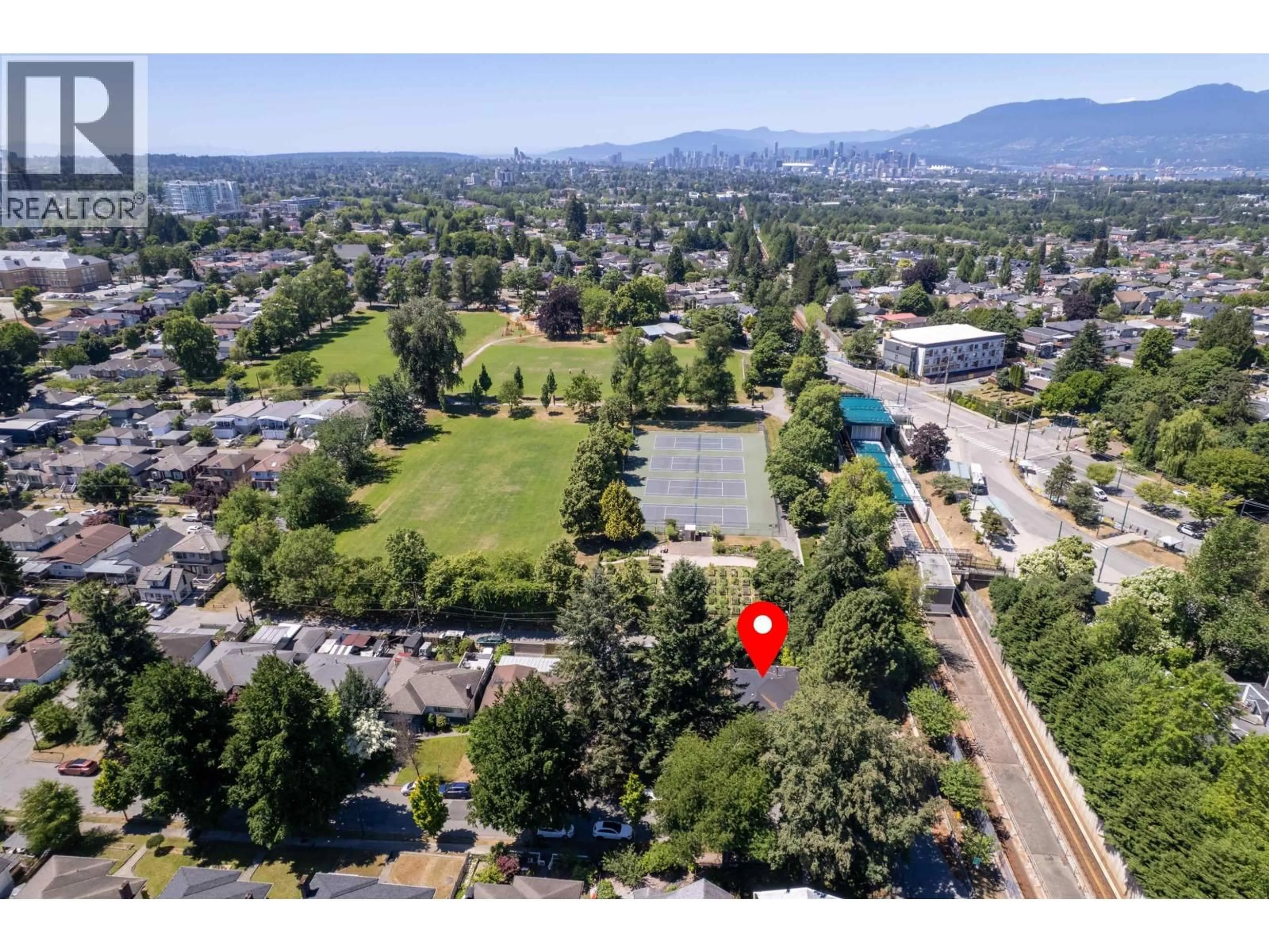 A pic from outside/outdoor area/front of a property/back of a property/a pic from drone, water/lake/river/ocean view for 4507 TODD STREET, Vancouver British Columbia V5R3P7