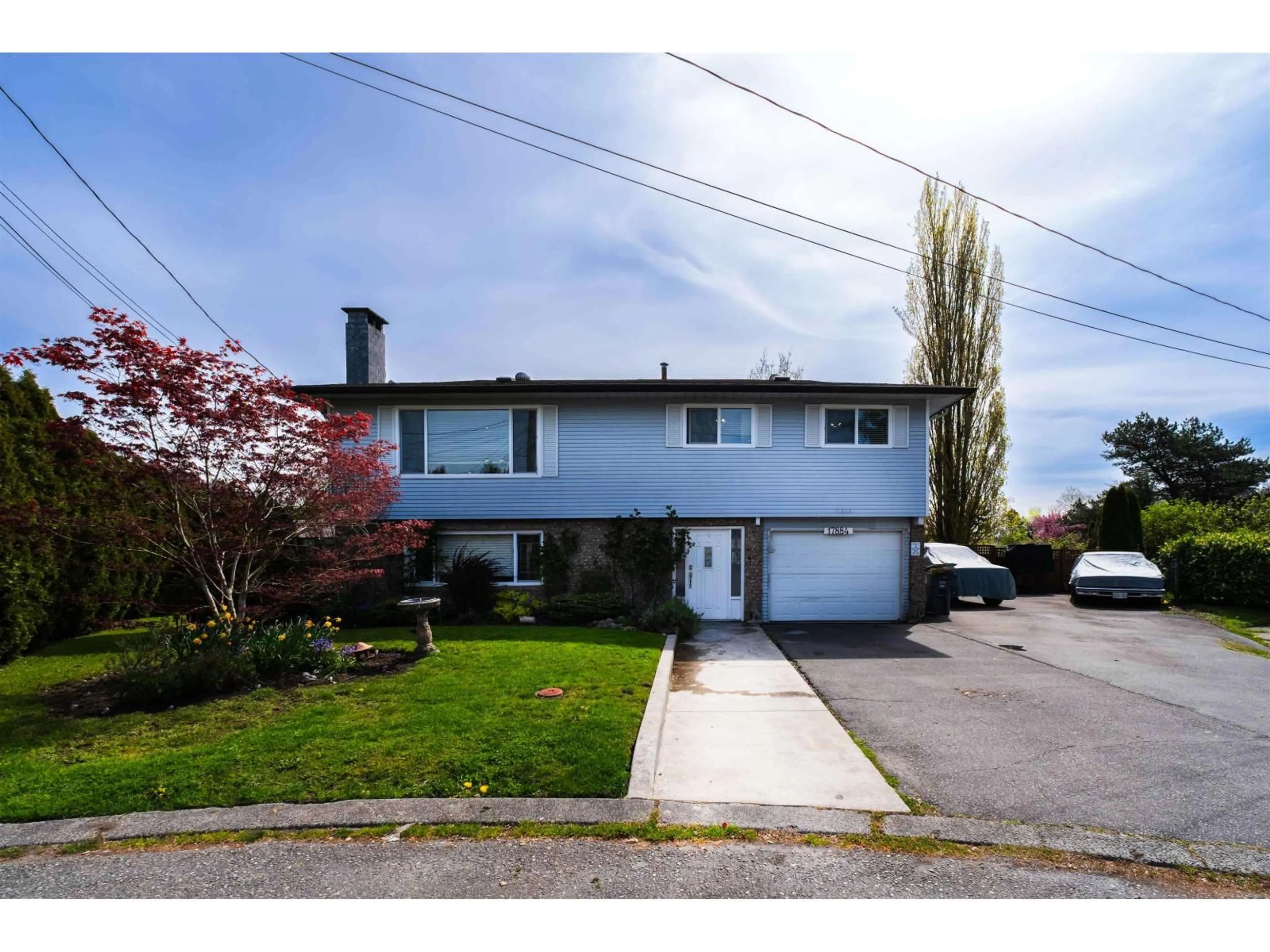 Home with vinyl exterior material, street for 17884 57 AVENUE, Surrey British Columbia V3S1H3