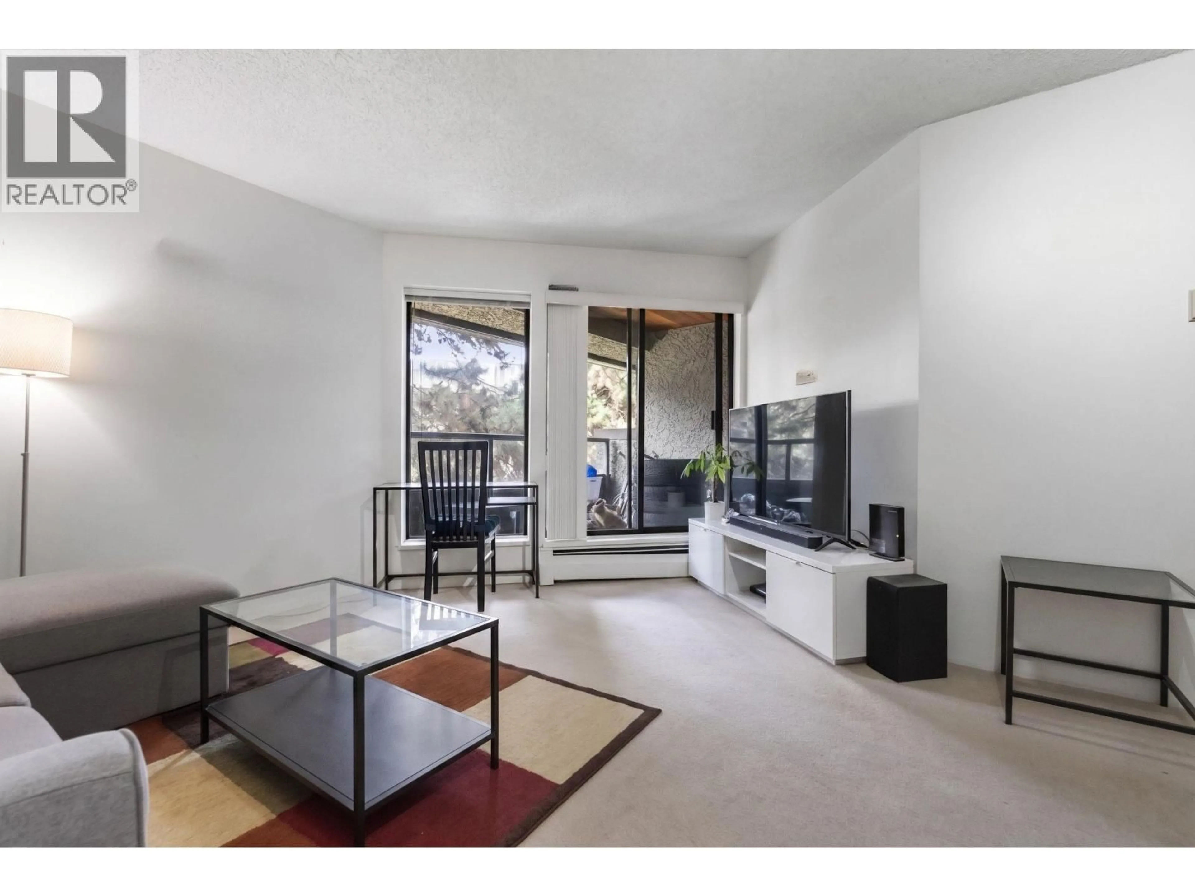 Living room with furniture, unknown for 230 - 8460 ACKROYD ROAD, Richmond British Columbia V6X3E9