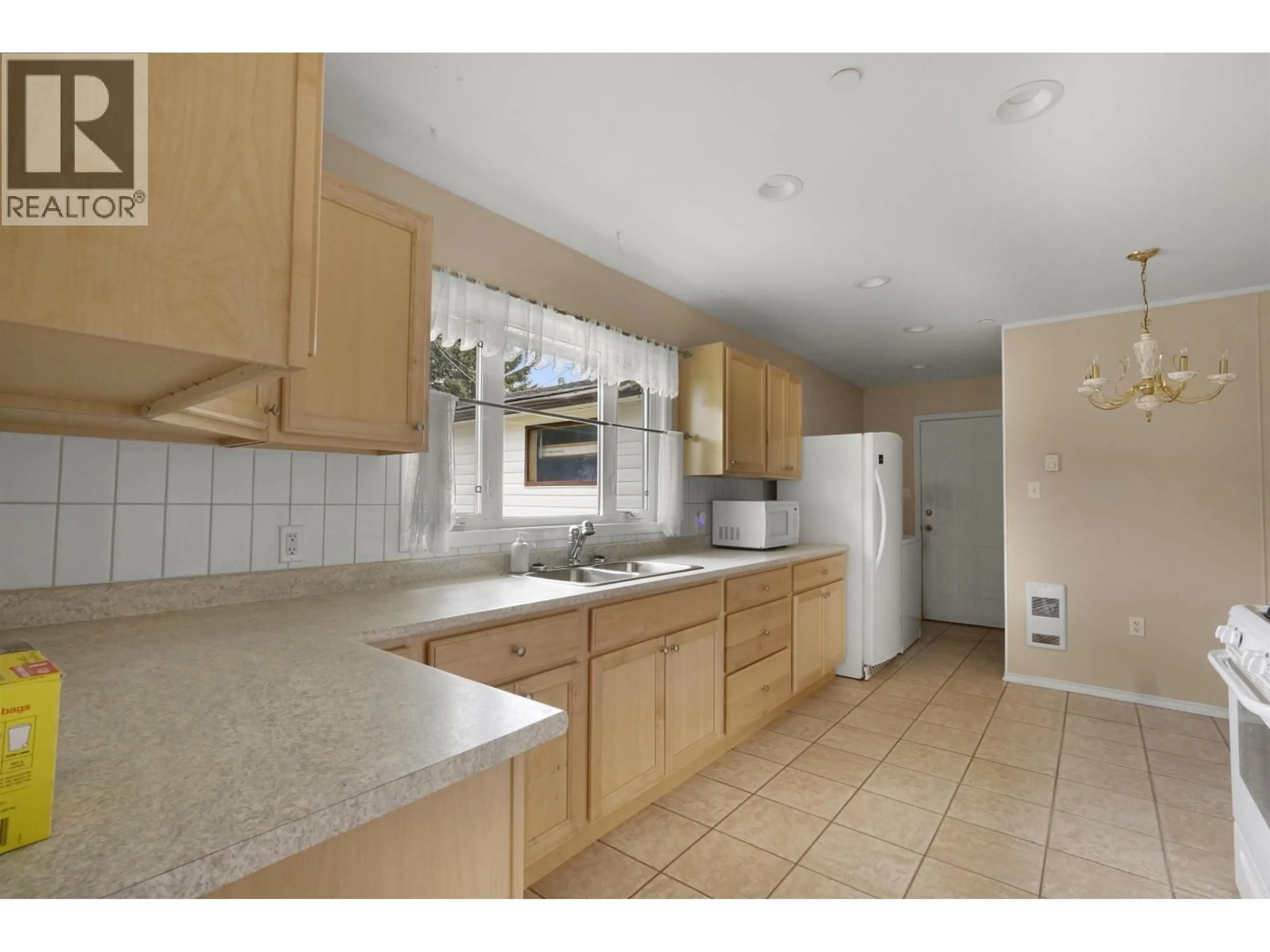 Standard kitchen, ceramic/tile floor for 71 CHILKO STREET, Kitimat British Columbia V8C1Y6