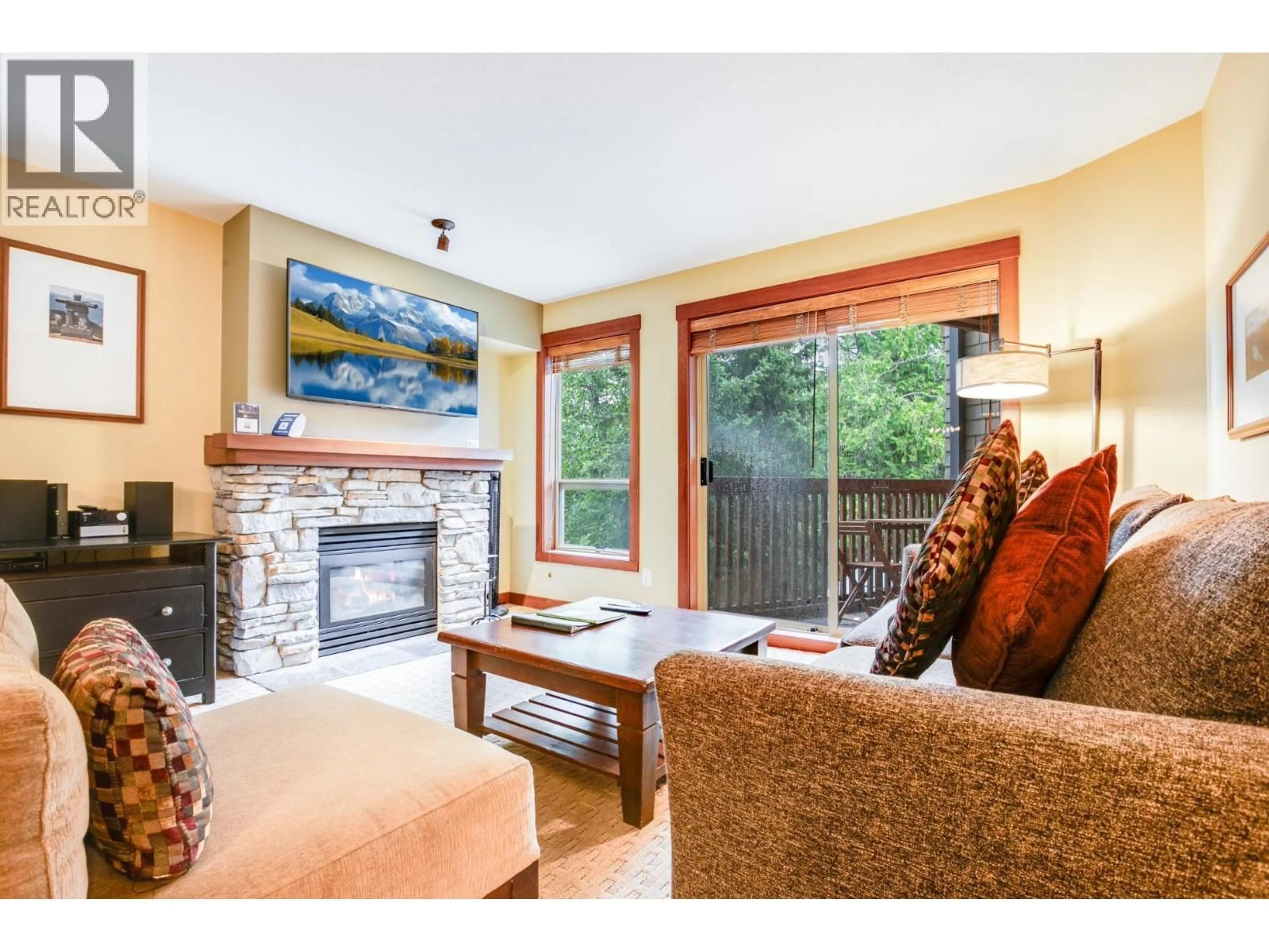 Living room with furniture, unknown for 303G2 - 4653 BLACKCOMB WAY, Whistler British Columbia V8E0Y9