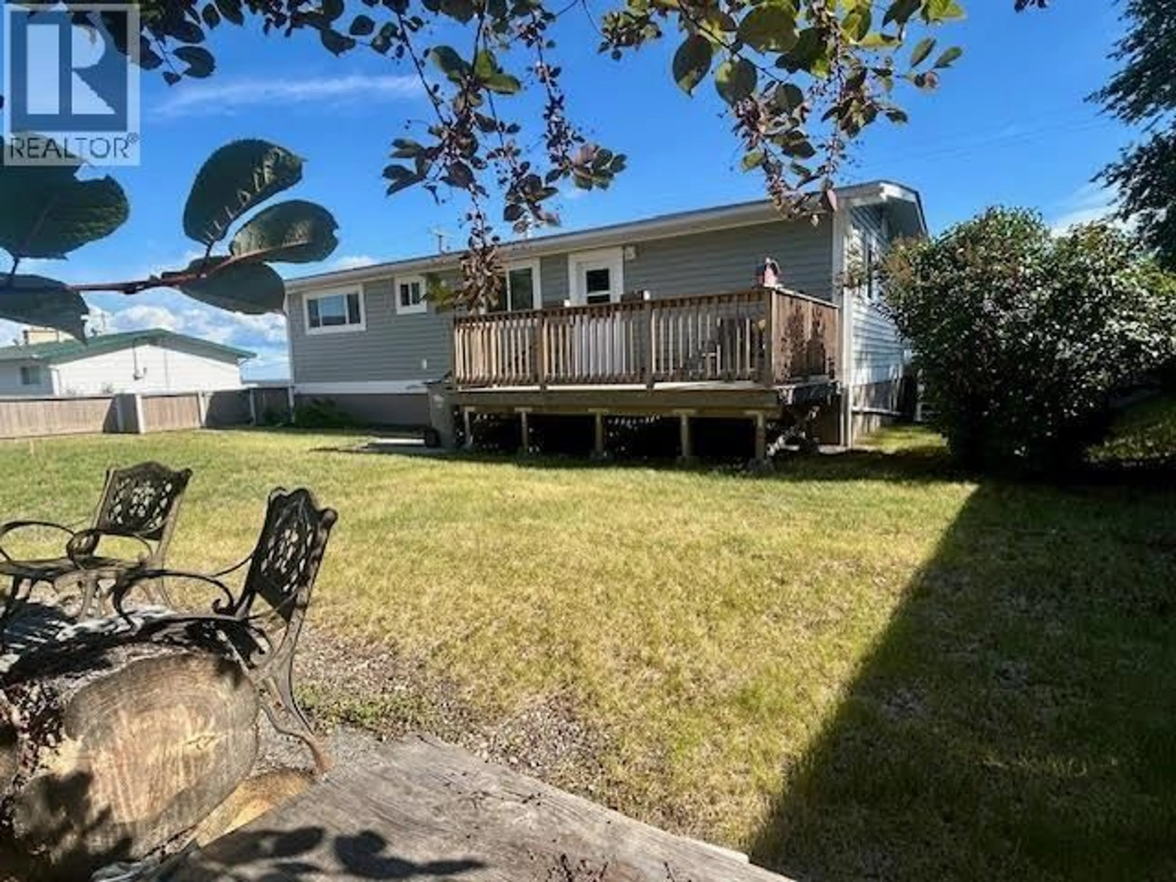 A pic from outside/outdoor area/front of a property/back of a property/a pic from drone, water/lake/river/ocean view for 5208 54 AVENUE, Fort Nelson British Columbia V0C1R0