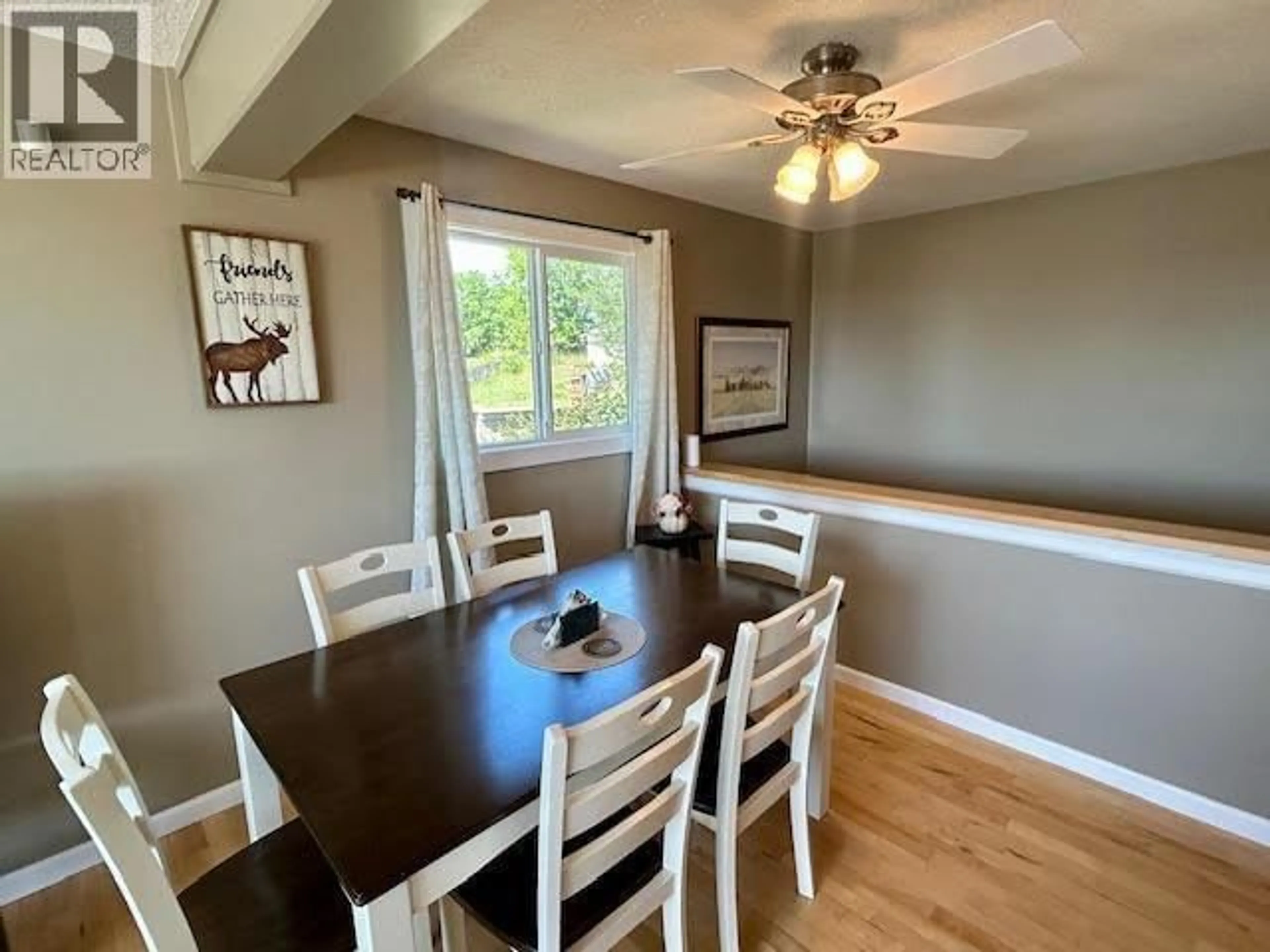 Dining room, wood/laminate floor for 5208 54 AVENUE, Fort Nelson British Columbia V0C1R0