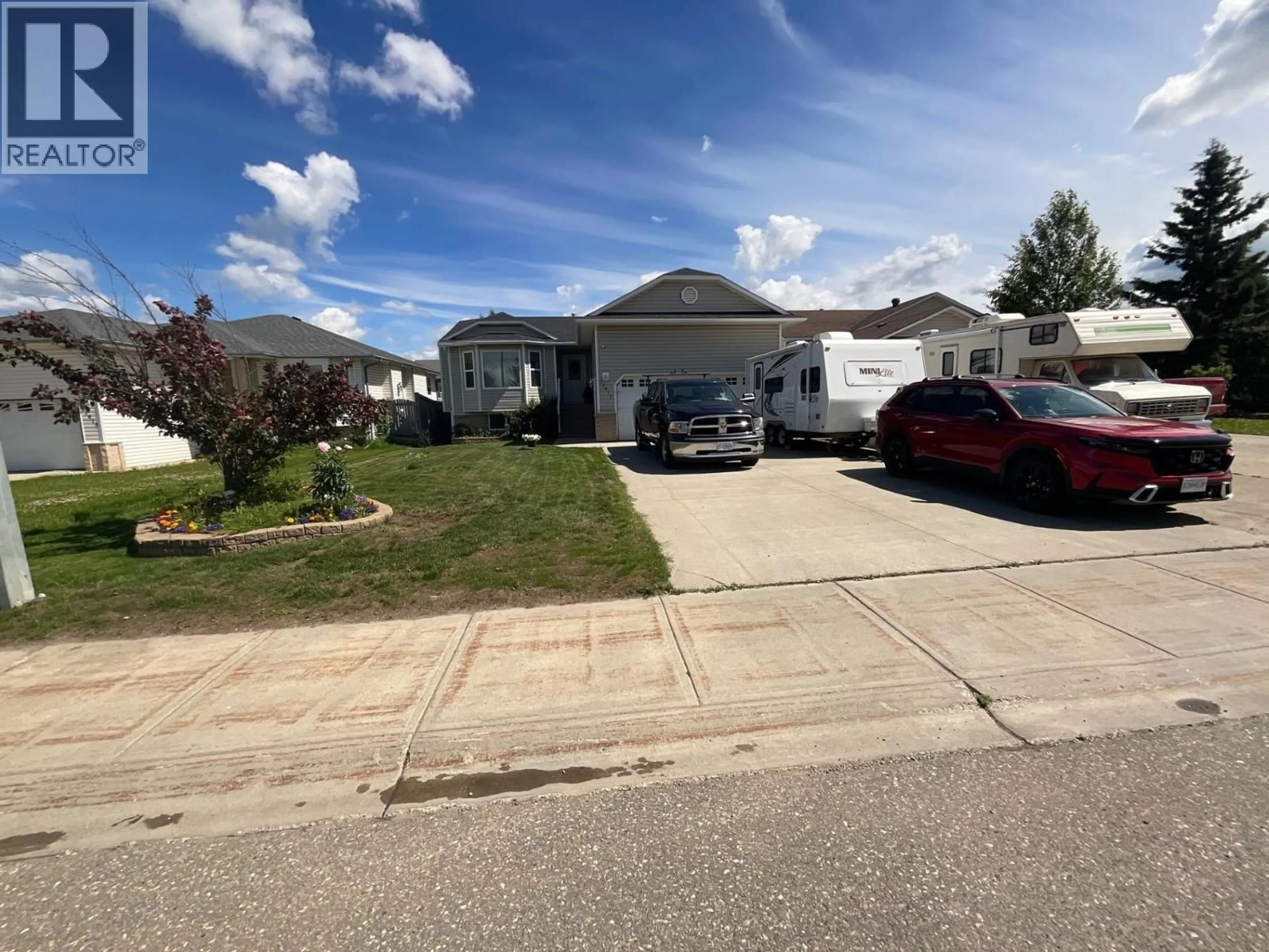 A pic from outside/outdoor area/front of a property/back of a property/a pic from drone, street for 11411 98 STREET, Fort St. John British Columbia V1J7B5