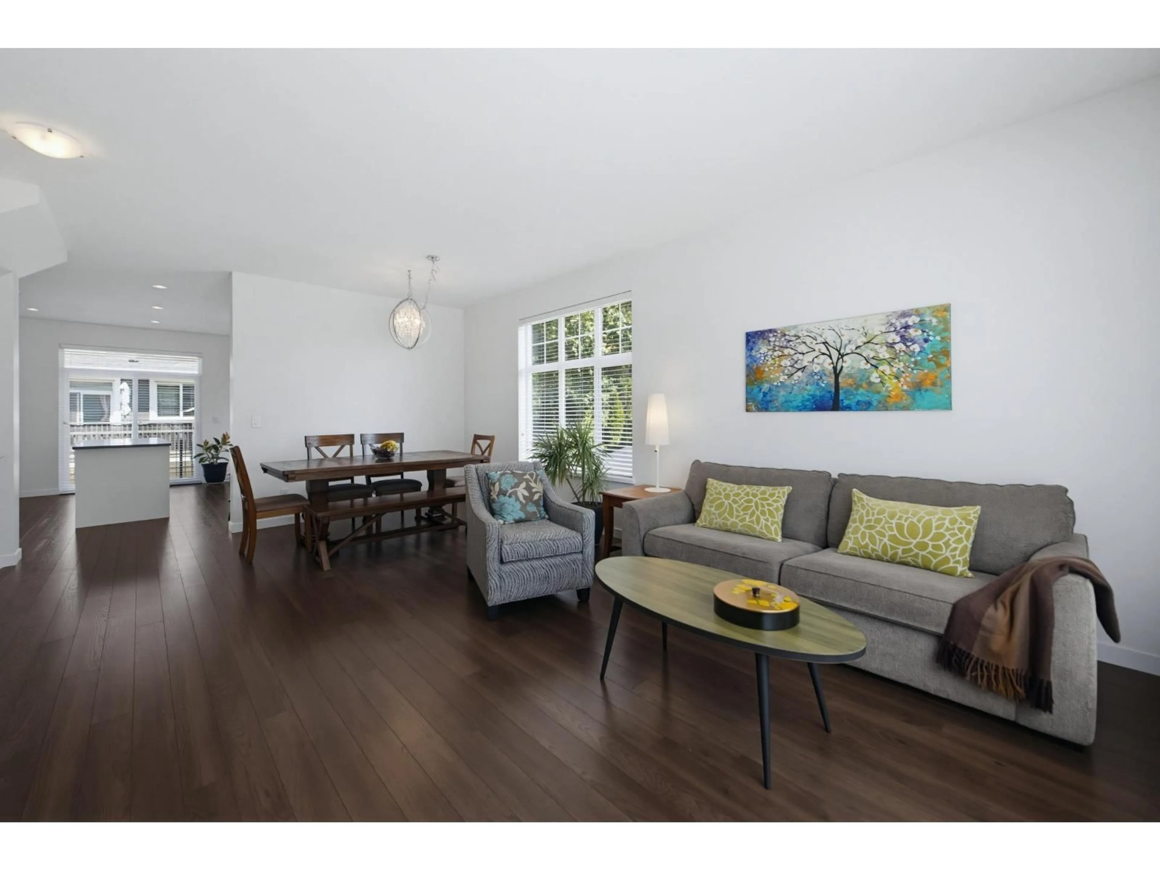 Living room with furniture, wood/laminate floor for 7 - 16357 15 AVENUE, Surrey British Columbia V4A0C2